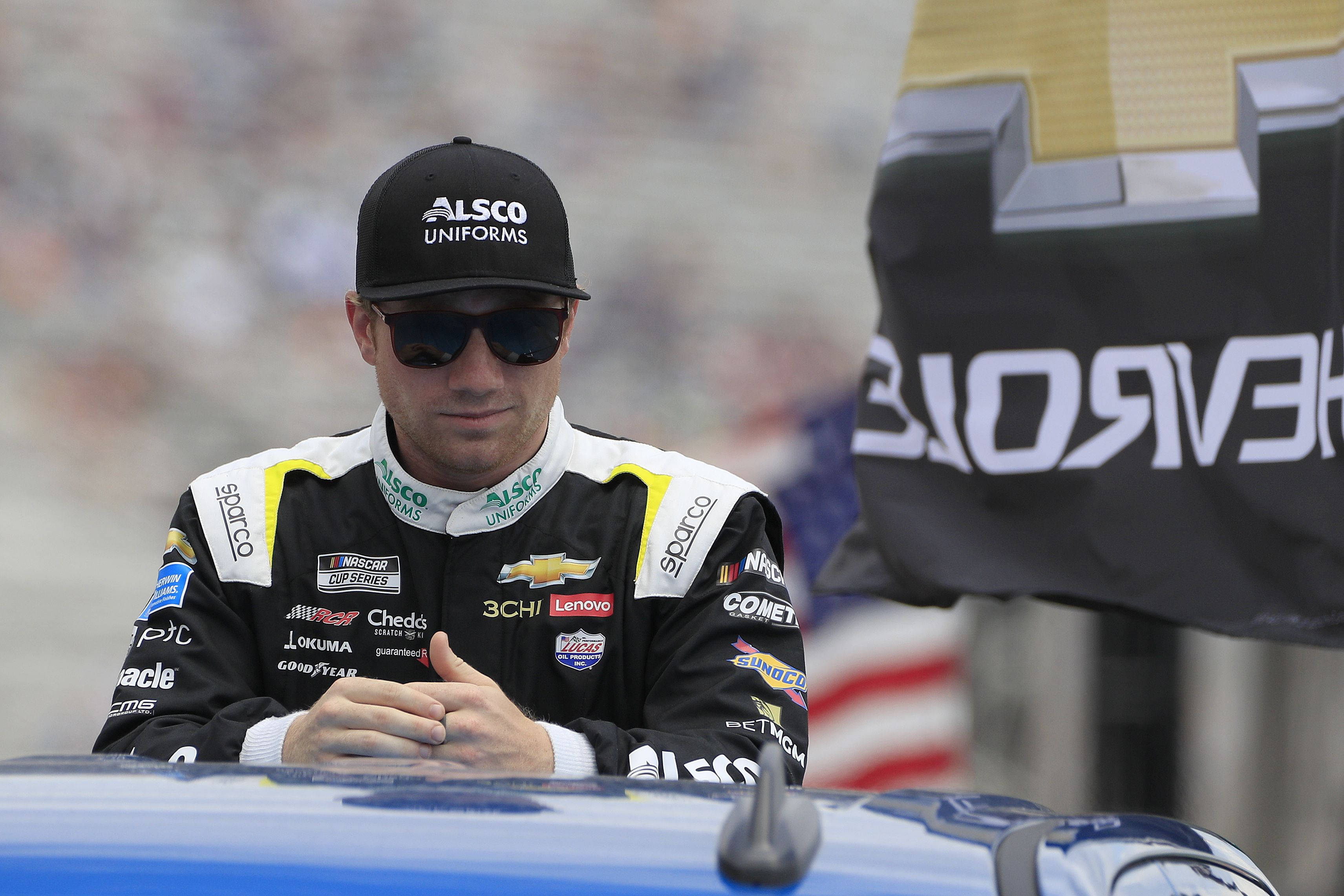 Tyler Reddick, black racing suit, cap, 2K Desktop Wallpaper