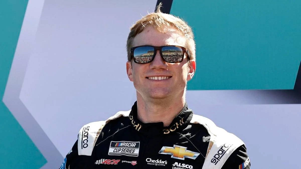 Tyler Reddick, black and white racing suit, sponsor logos, SD Desktop Wallpaper