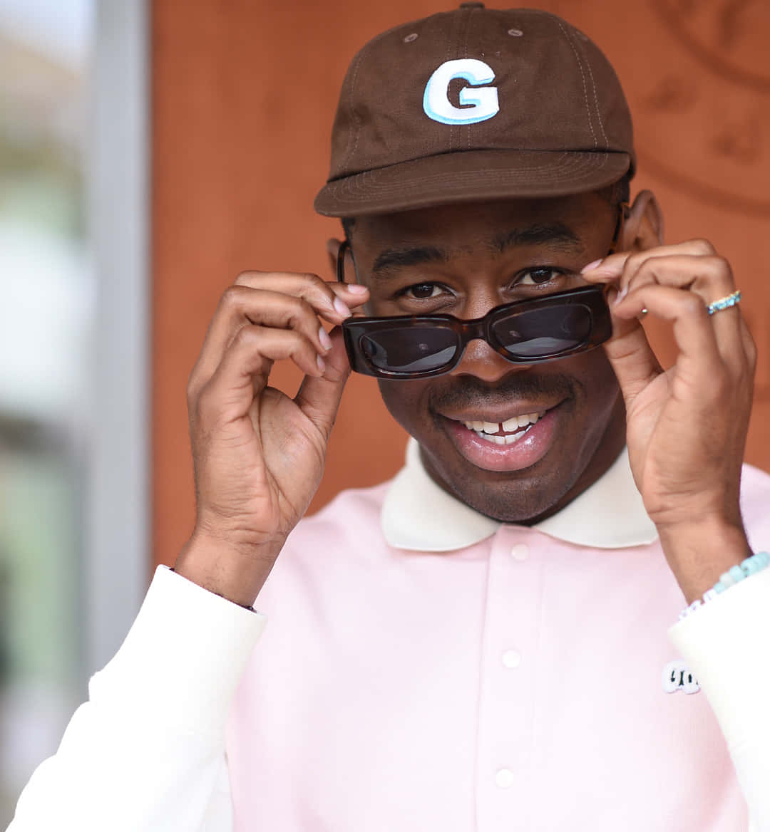 Tyler The Creator, pink polo, brown cap, SD Phone Wallpaper