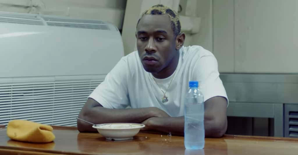Tyler The Creator, braided hair, wooden table, SD Desktop Wallpaper