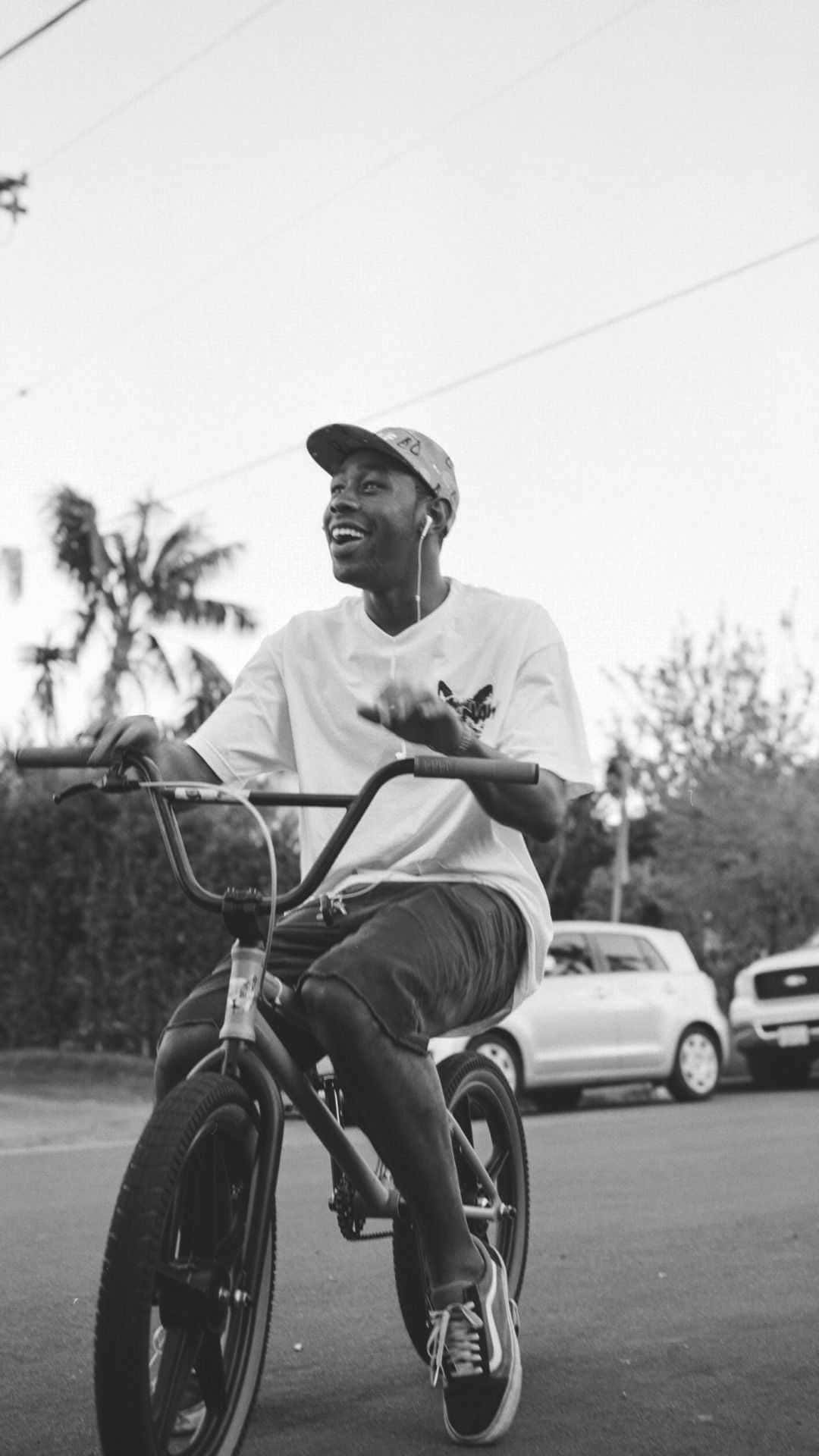 Tyler The Creator, BMX bike, palm trees, Full HD Phone Wallpaper