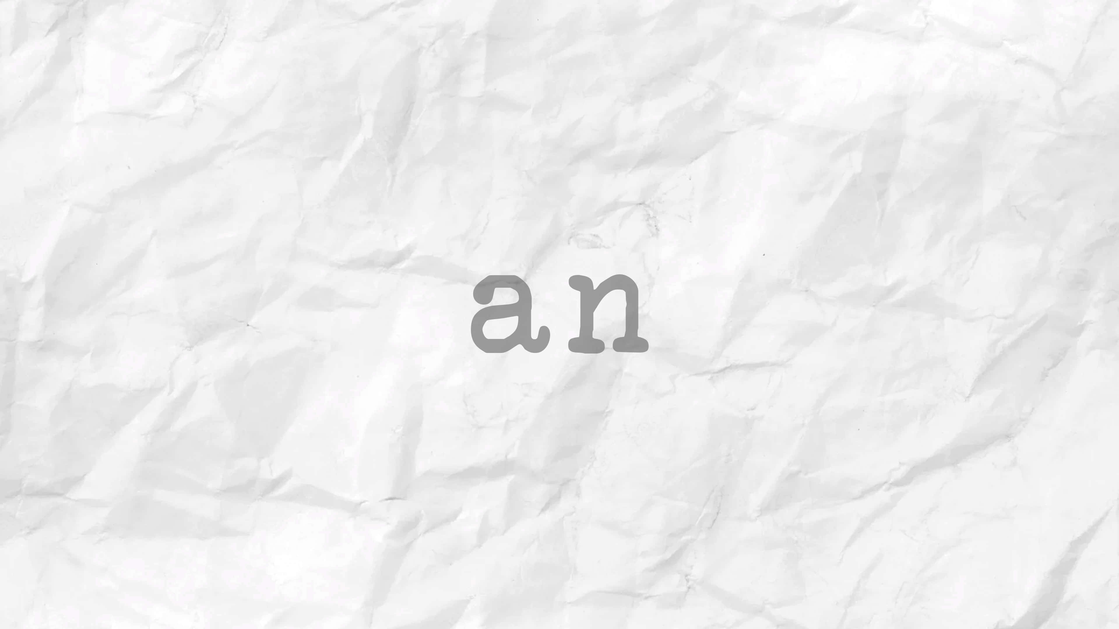 an, gray font, textured white crumpled paper background, 4K Desktop Wallpaper