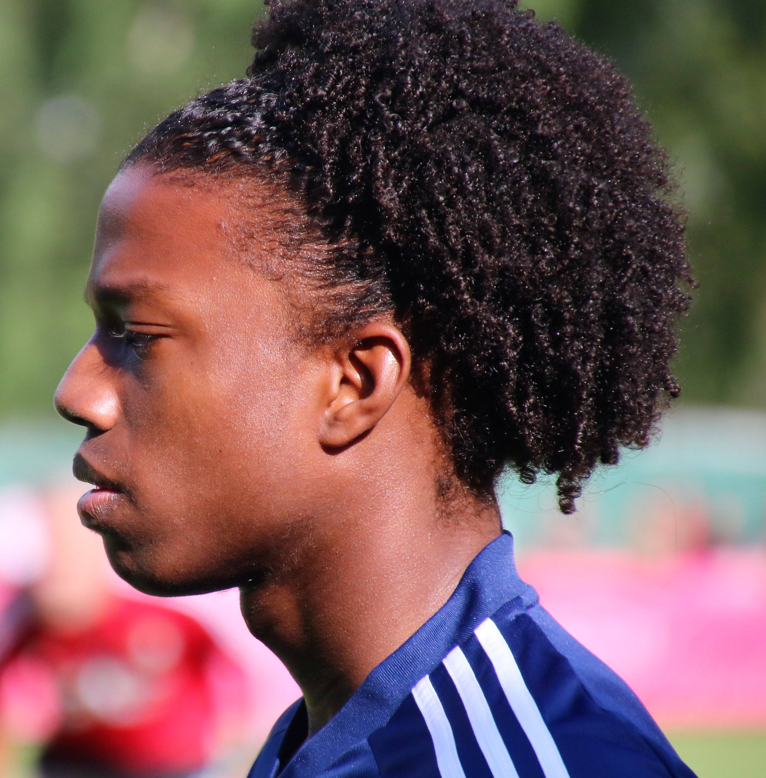 Tyrell Malacia, blue Adidas jersey, curly hair, 2K Phone Wallpaper