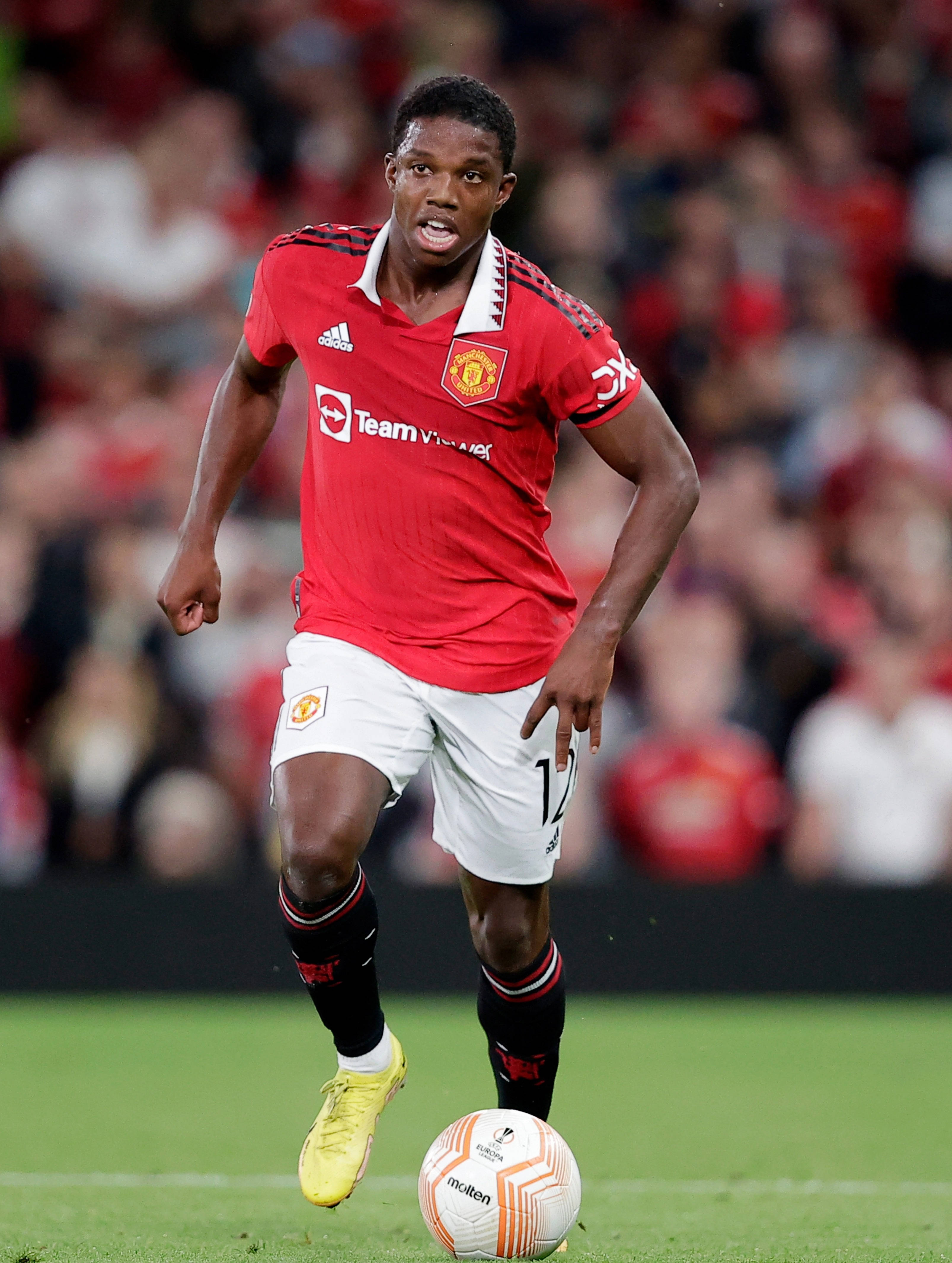 Tyrell Malacia, neon shoes, red Manchester United jersey, 4K Phone Wallpaper