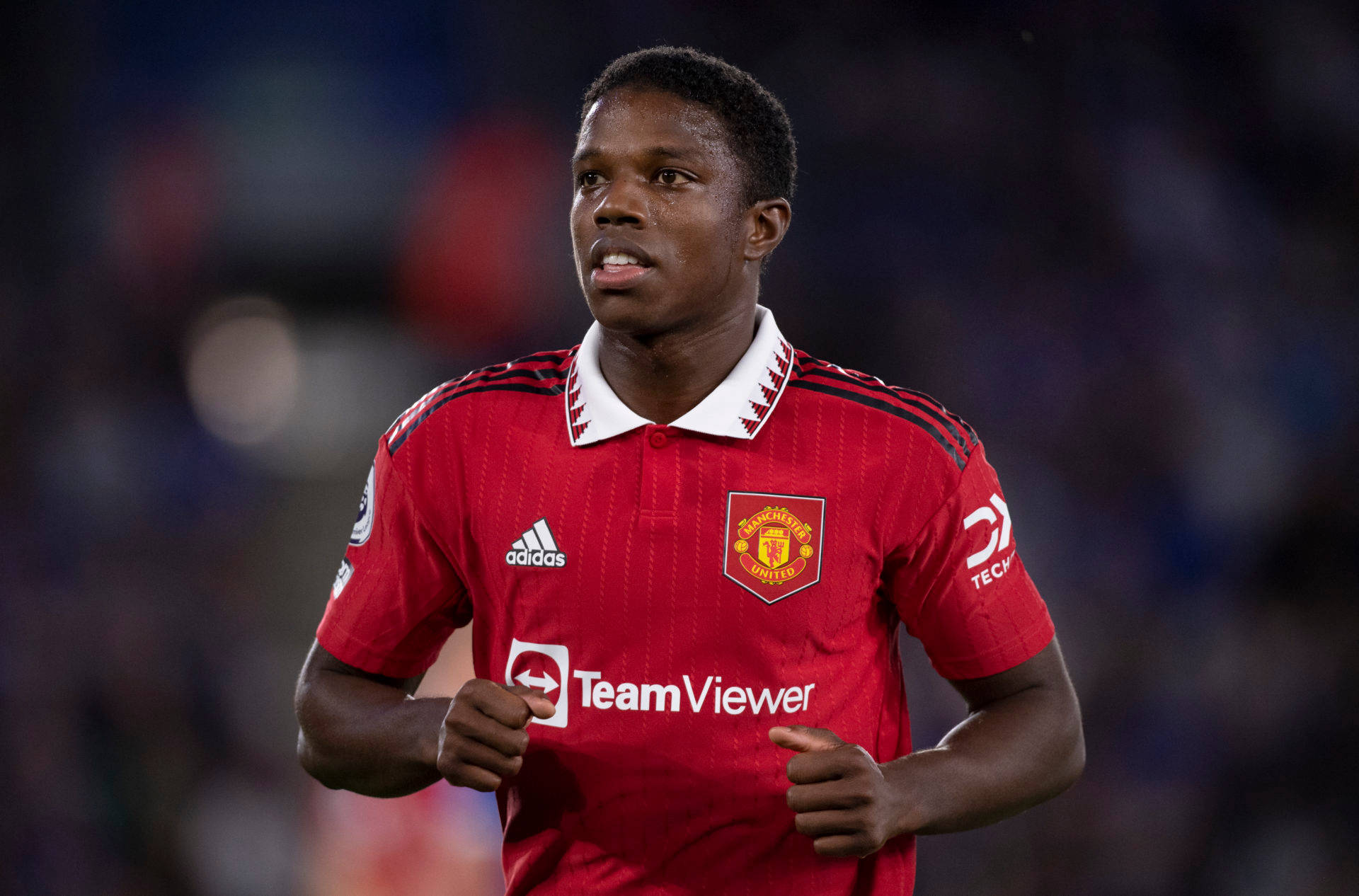 Tyrell Malacia, red Manchester United jersey, stadium lights, Full HD Desktop Wallpaper