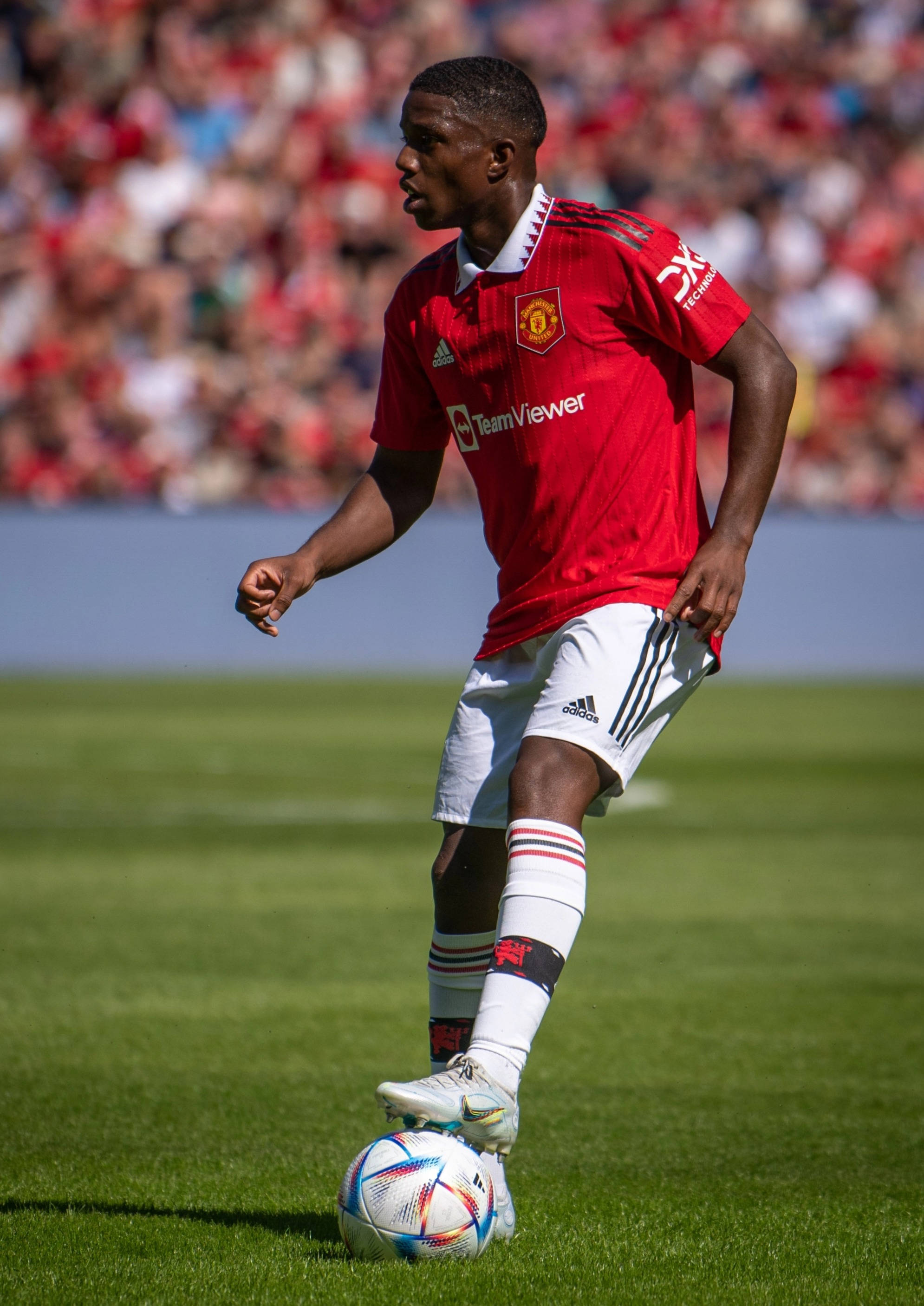 Tyrell Malacia, red Manchester United jersey, colorful ball, 2K Phone Wallpaper