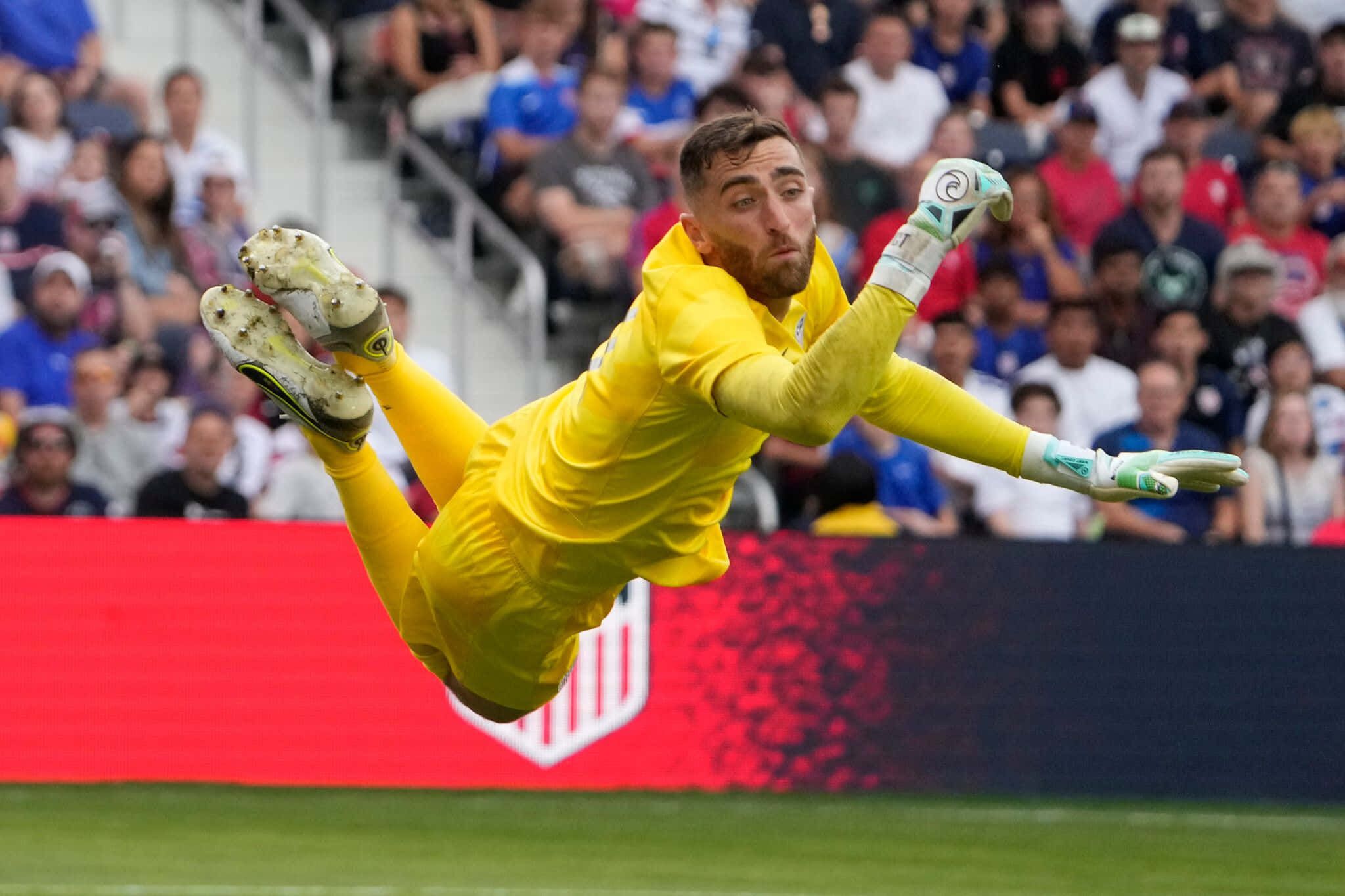 soccer goalkeeper, bright yellow uniform, midair, Full HD Desktop Wallpaper