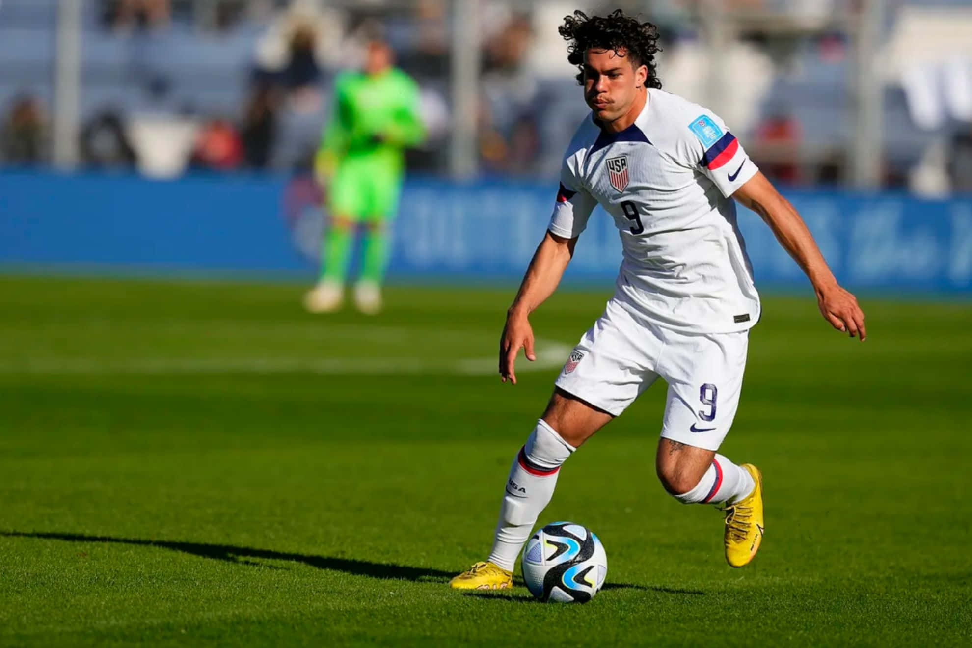 U S A Soccer Player, white US jersey number 9, blue and white ball, Full HD Desktop Wallpaper
