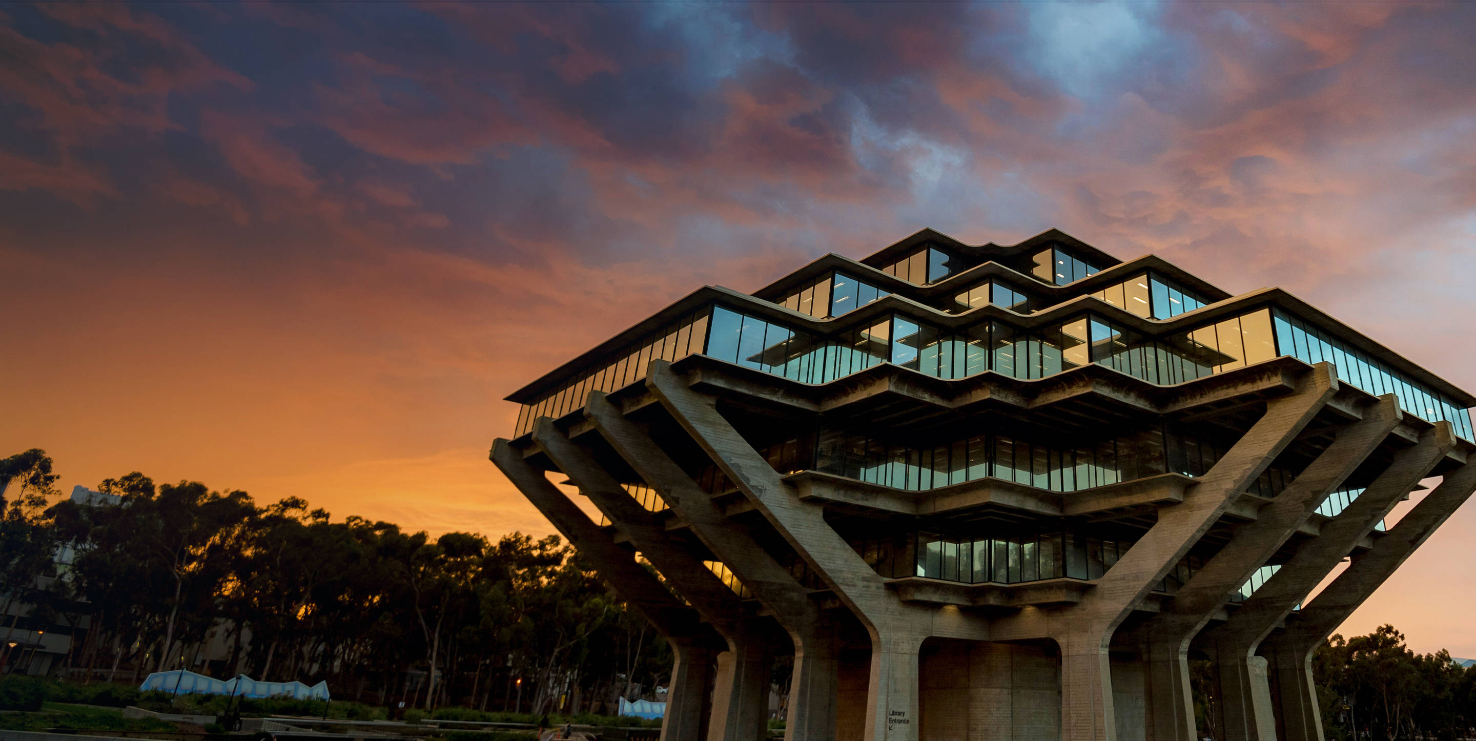 Golden Sky UCSD, modern concrete building, glass balconies, 2K Desktop Wallpaper