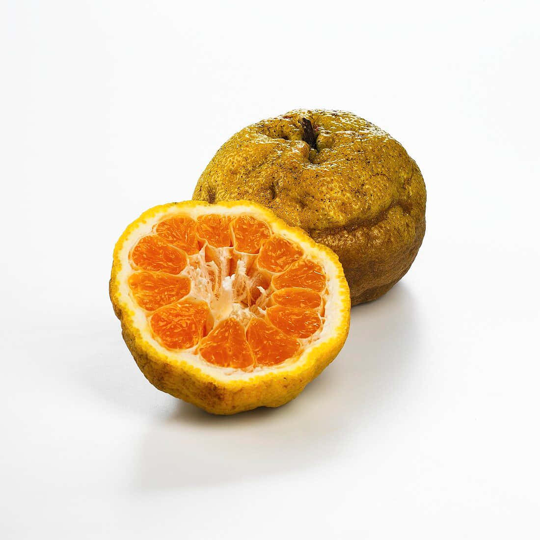 Ugli citrus fruits, vibrant orange segments, bumpy textured rind, SD Desktop Wallpaper