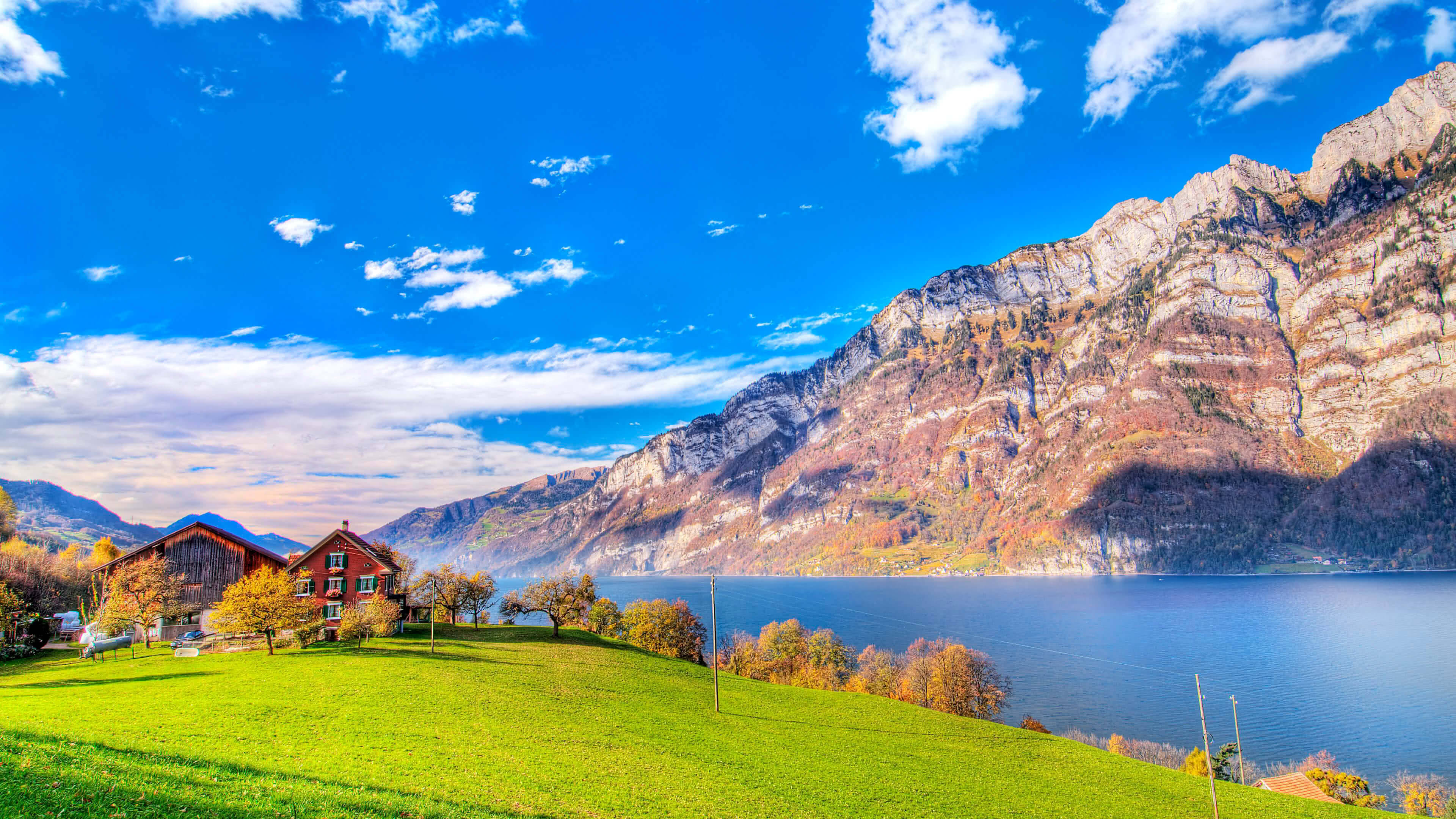 mountain lake house, vibrant red chalet, sunlit green hill, 4K Desktop Wallpaper