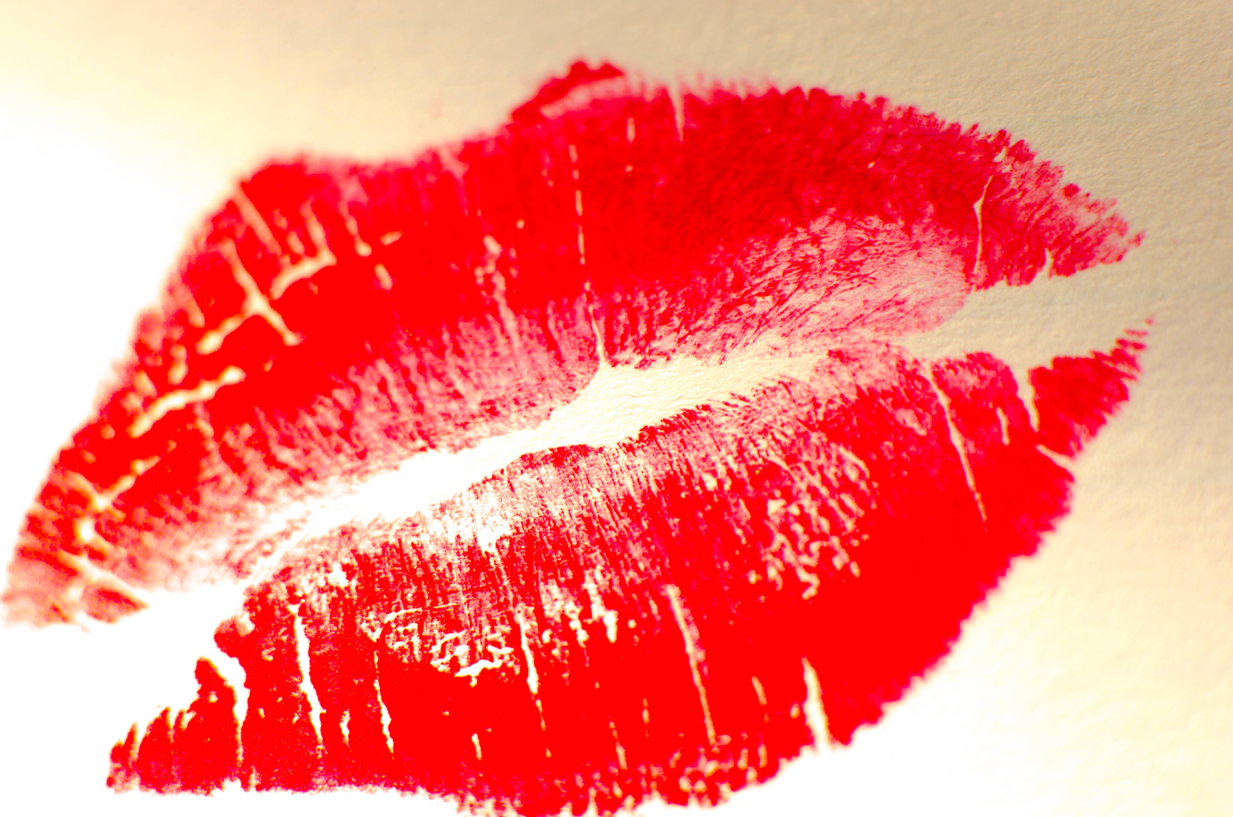 red lipstick, pale textured surface, brushstroke texture, 4K Desktop Wallpaper
