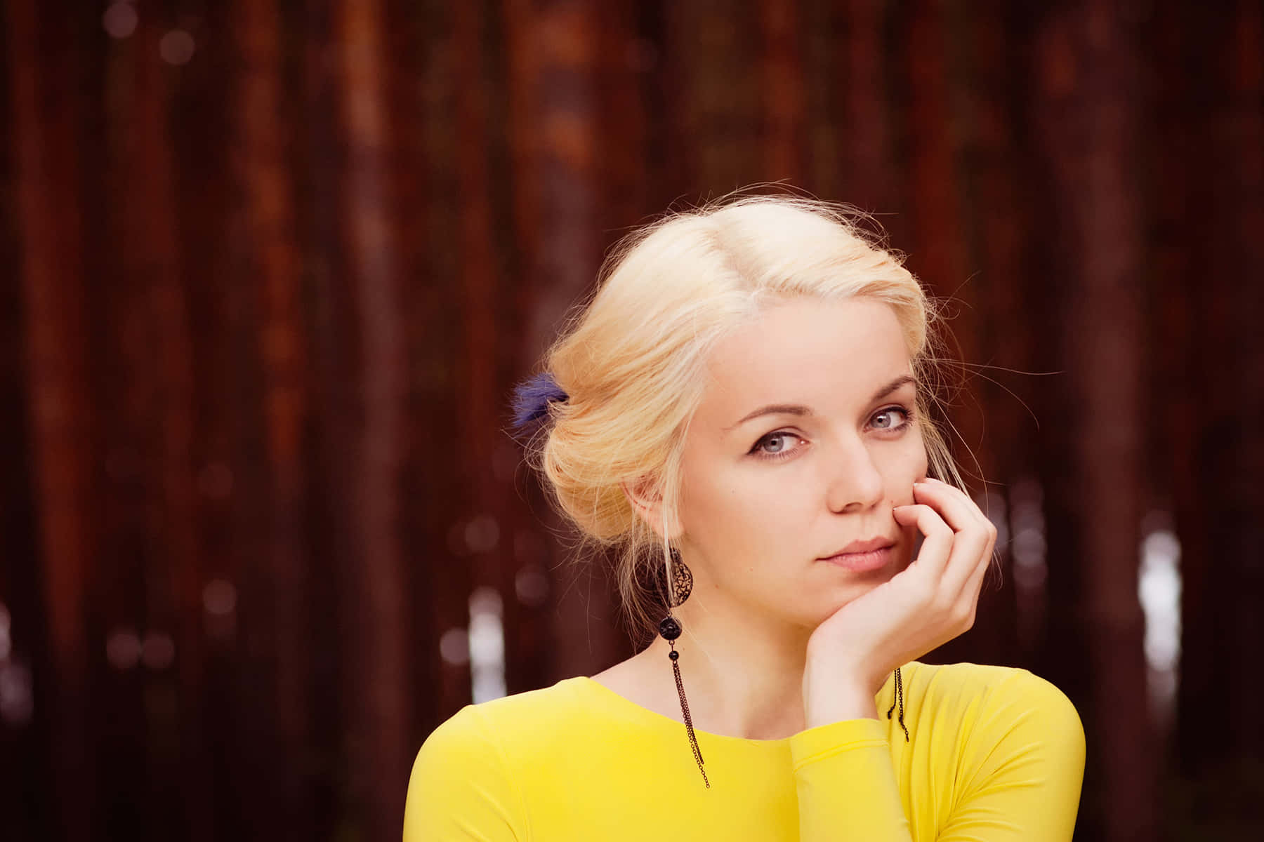 blonde Ukrainian girl, bright yellow top, blurred wooden backdrop, HD Desktop Wallpaper