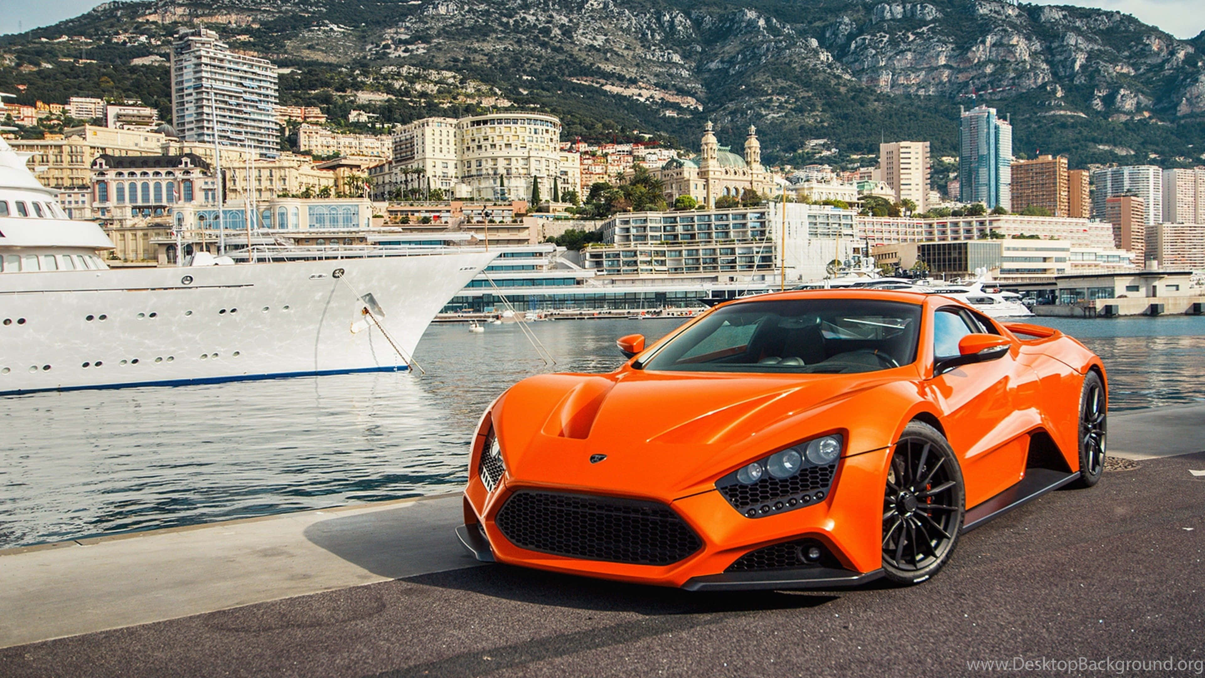 Ultra Wide 4K Car, vibrant orange sports car, harbor, 4K Desktop Wallpaper