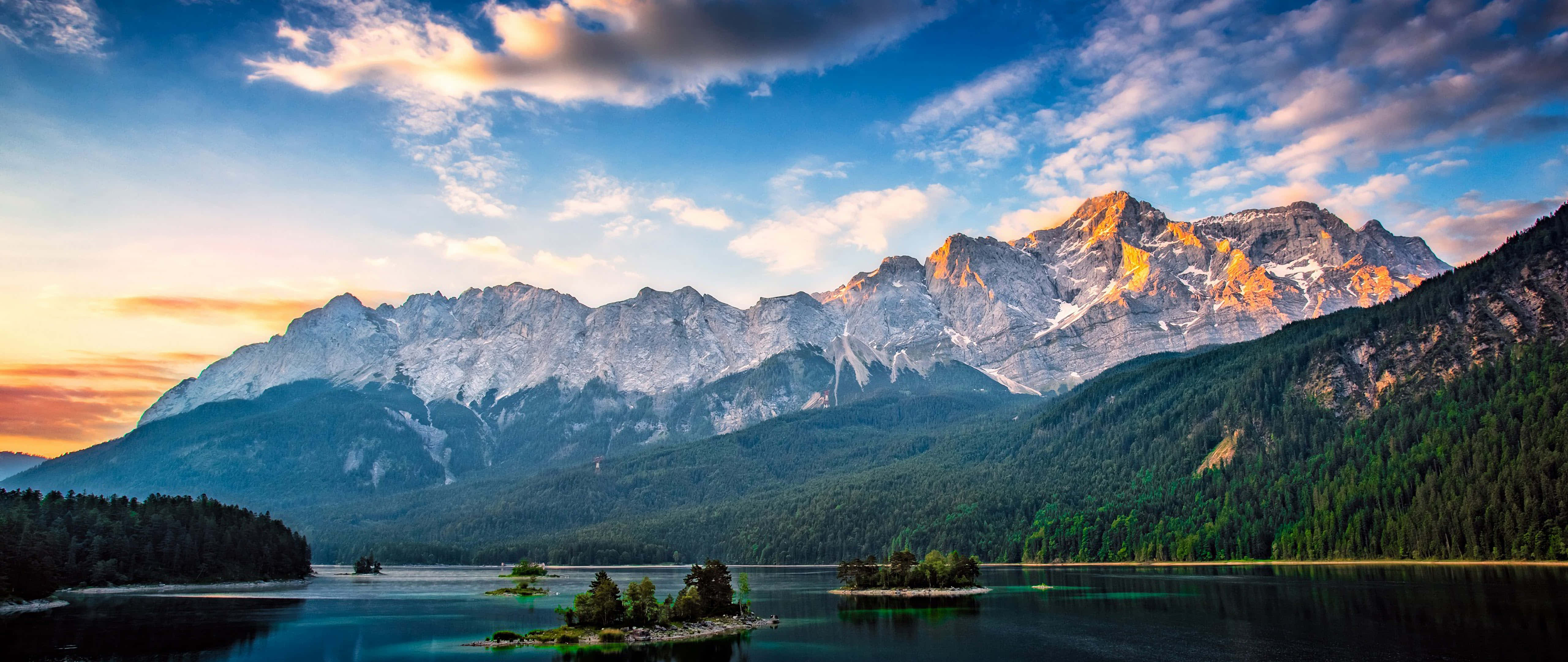 alpine lake, snow-capped mountains, golden sunset light, 5K Desktop Wallpaper