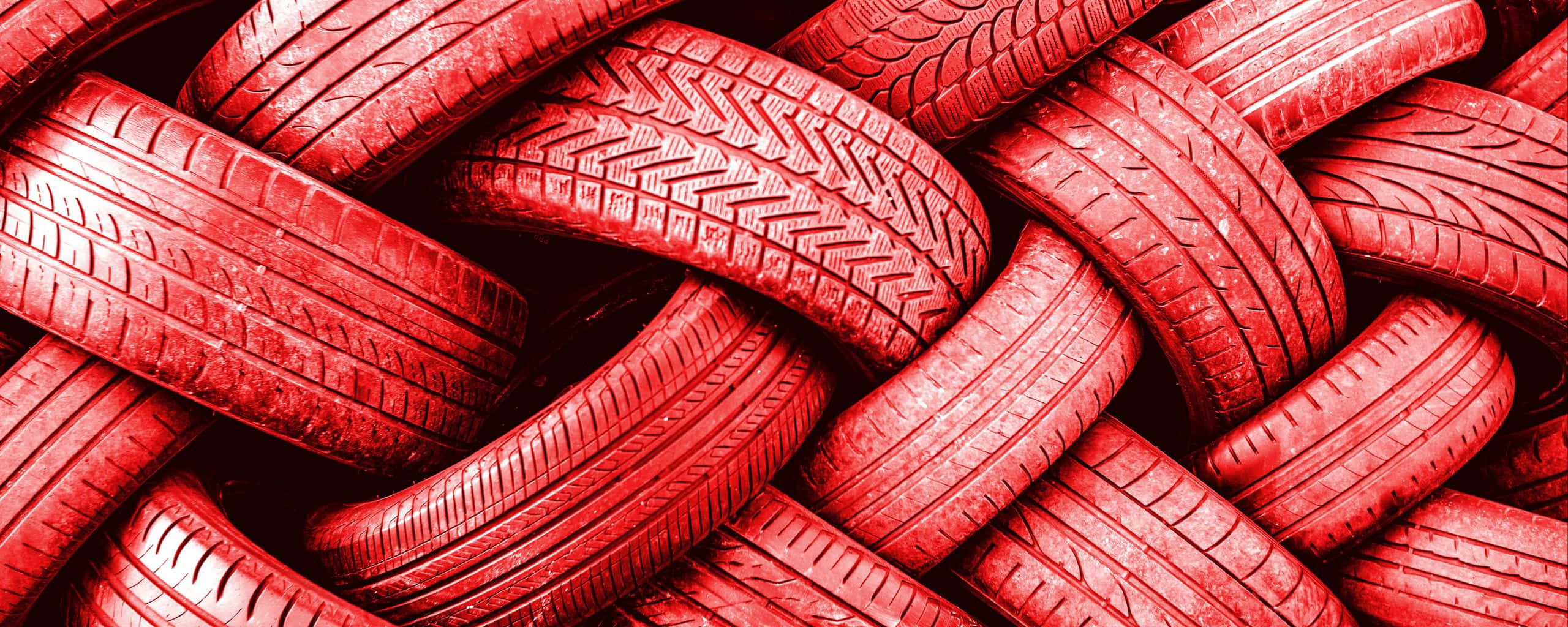 red car tires, dense woven pattern, detailed tread textures, 2K Desktop Wallpaper