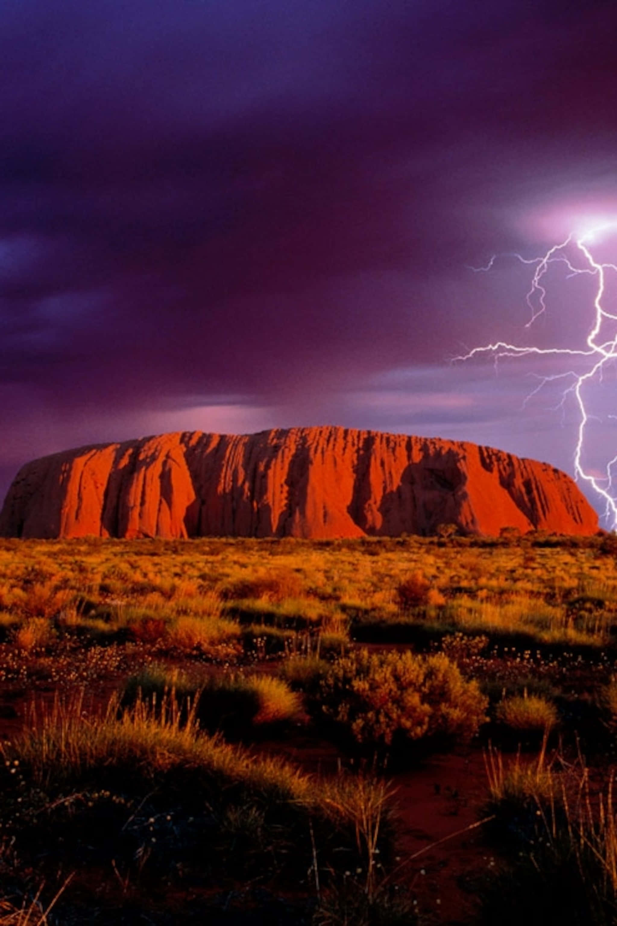 Uluru, lightning bolt, red rock formation, 2K Phone Wallpaper