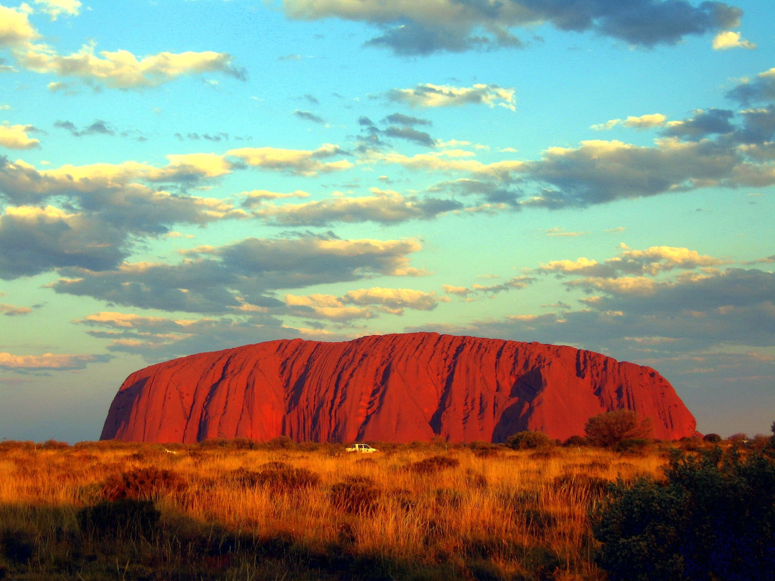 Uluru, turquoise sky, golden hour, 2K Desktop Wallpaper
