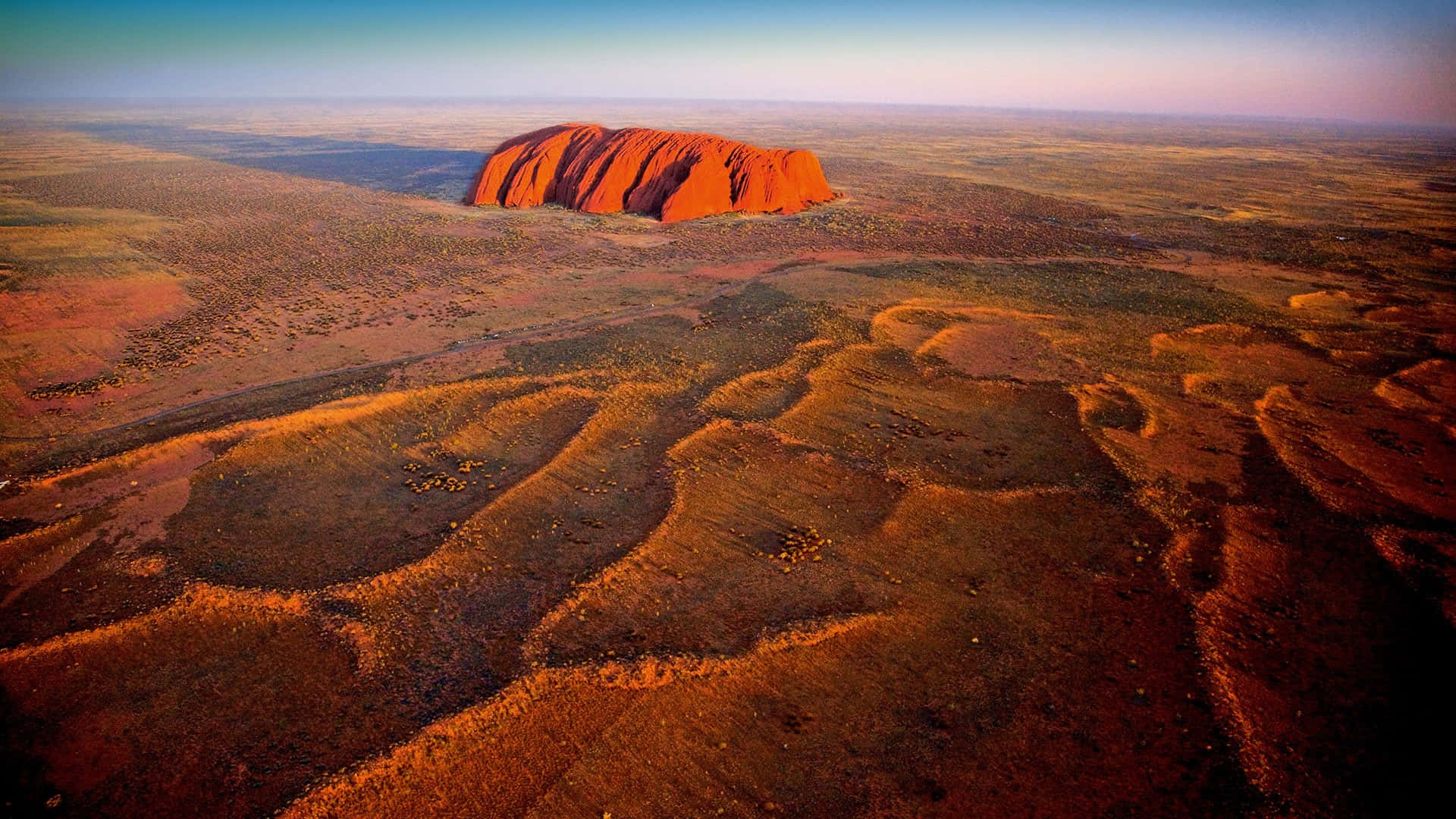 Uluru, red desert plains, golden sunset light, Full HD Desktop Wallpaper