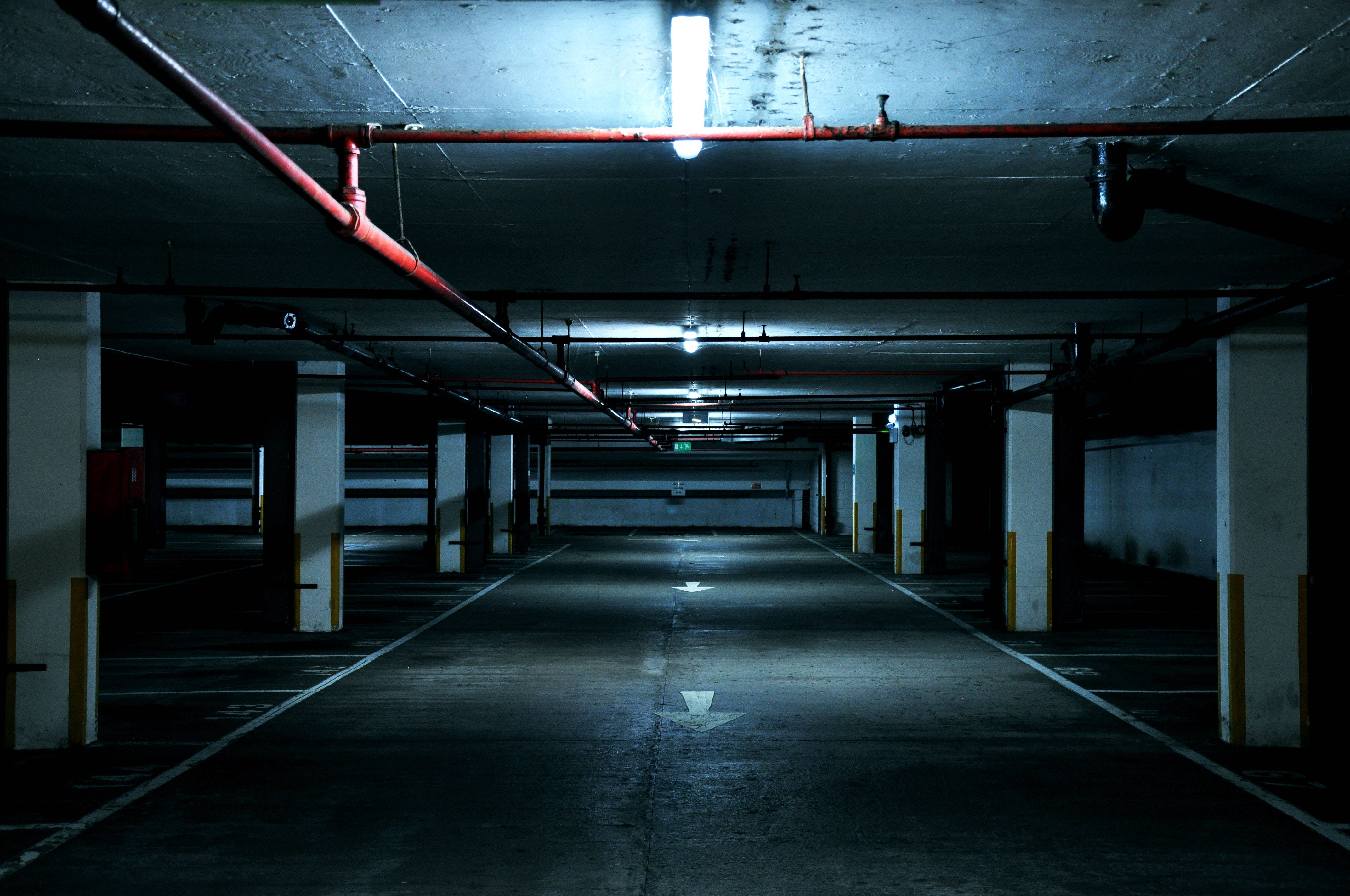 underground parking, fluorescent lights, concrete pillars, 4K Desktop Wallpaper