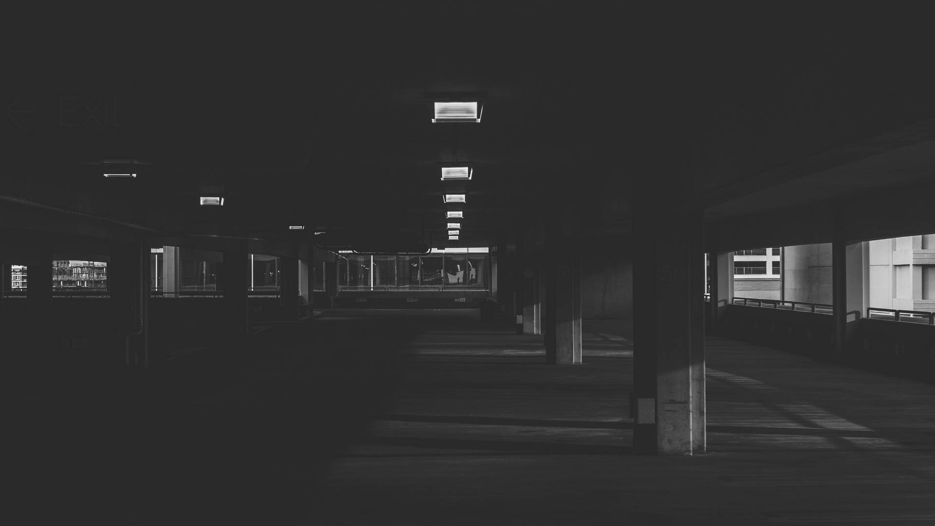 Underground Parking, concrete pillars, glowing exit signs, Full HD Desktop Wallpaper