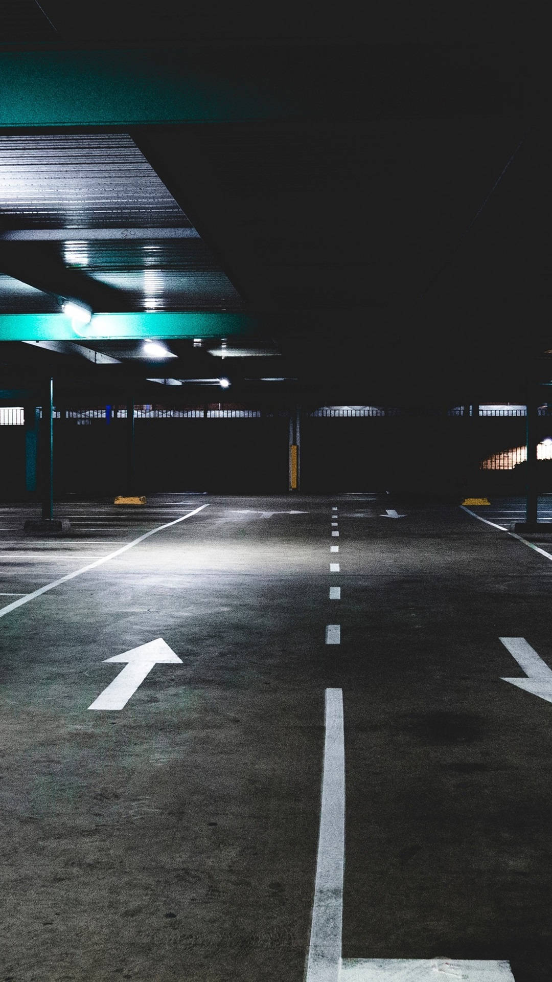 underground parking garage, stark white directional arrows, glowing green ceiling lights, Full HD Phone Wallpaper