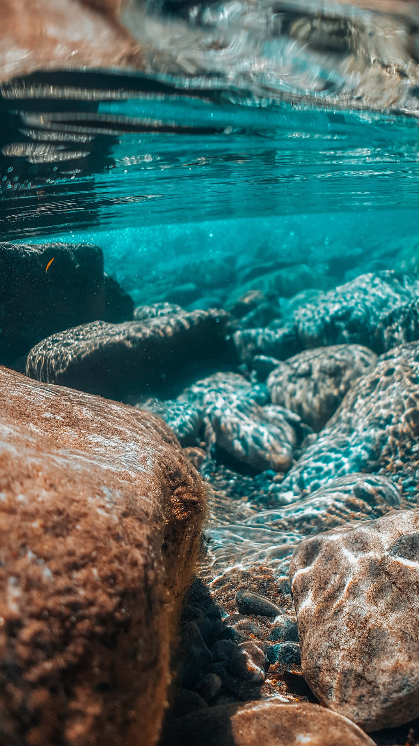 Underwater iPhone, turquoise water, sunlit, 2K Phone Wallpaper