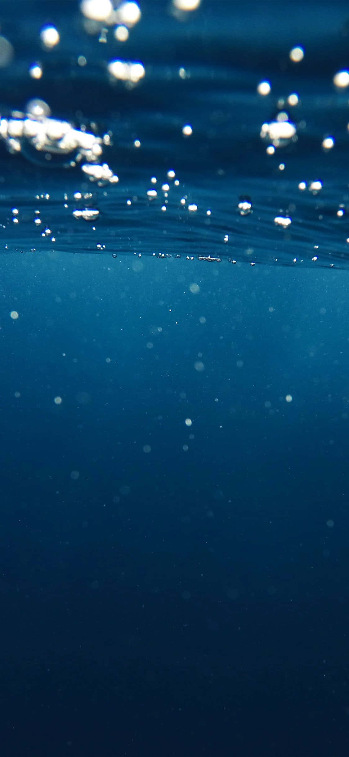 underwater, sunlit ocean surface, shimmering bubbles, Full HD Phone Wallpaper