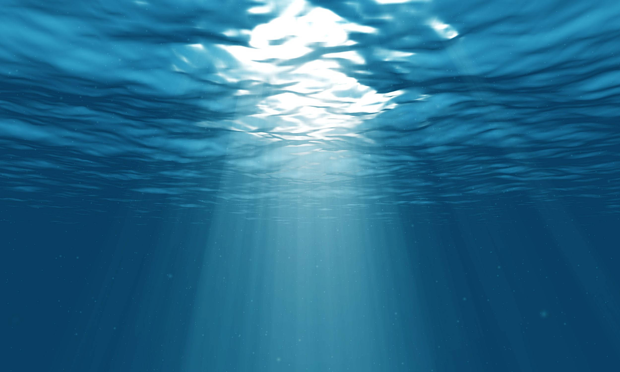 sunlight beams, rippling ocean surface, deep blue water, Full HD Desktop Wallpaper