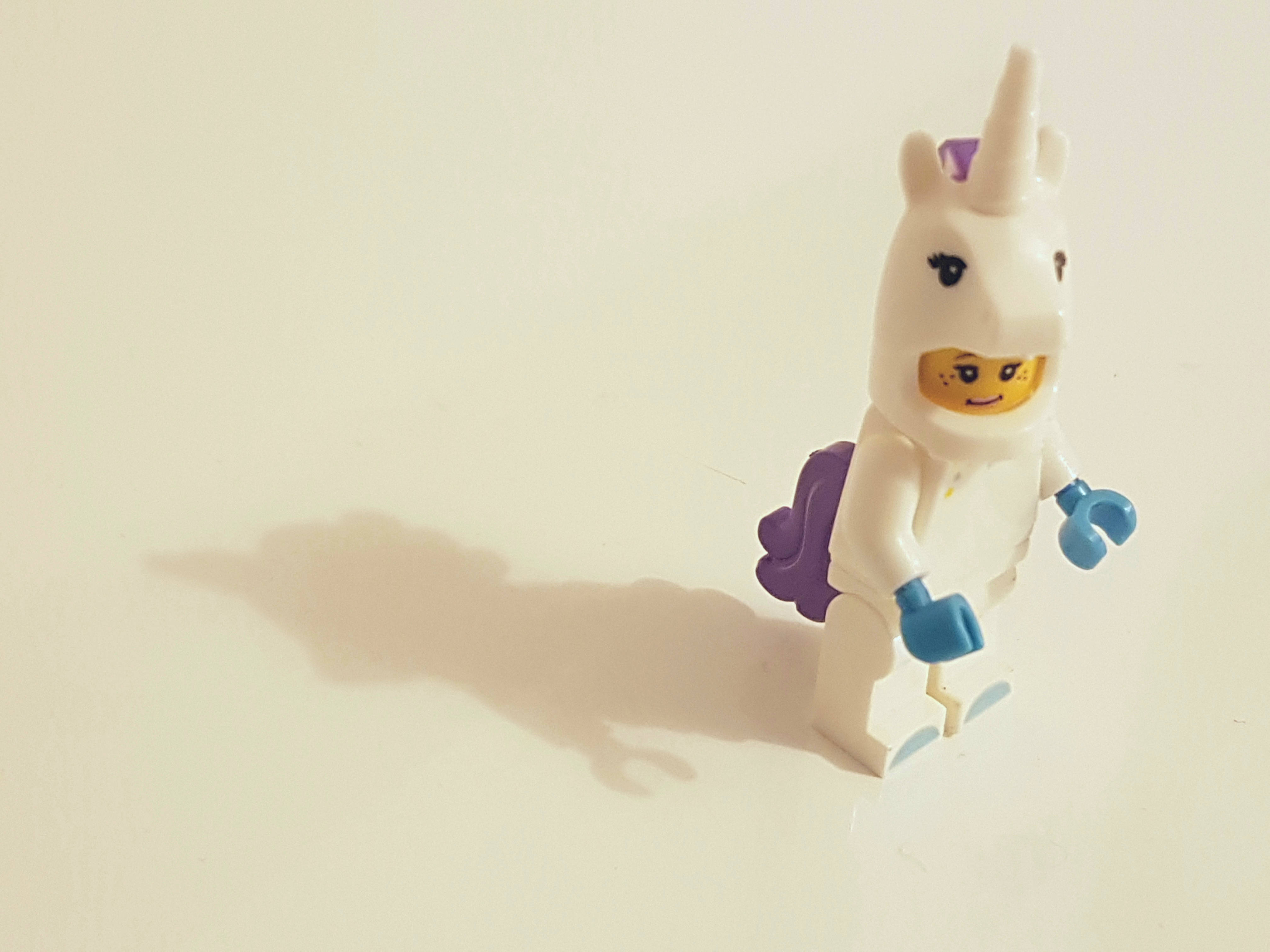 enchanted unicorn, mystical forest, white LEGO minifigure, 4K Desktop Wallpaper