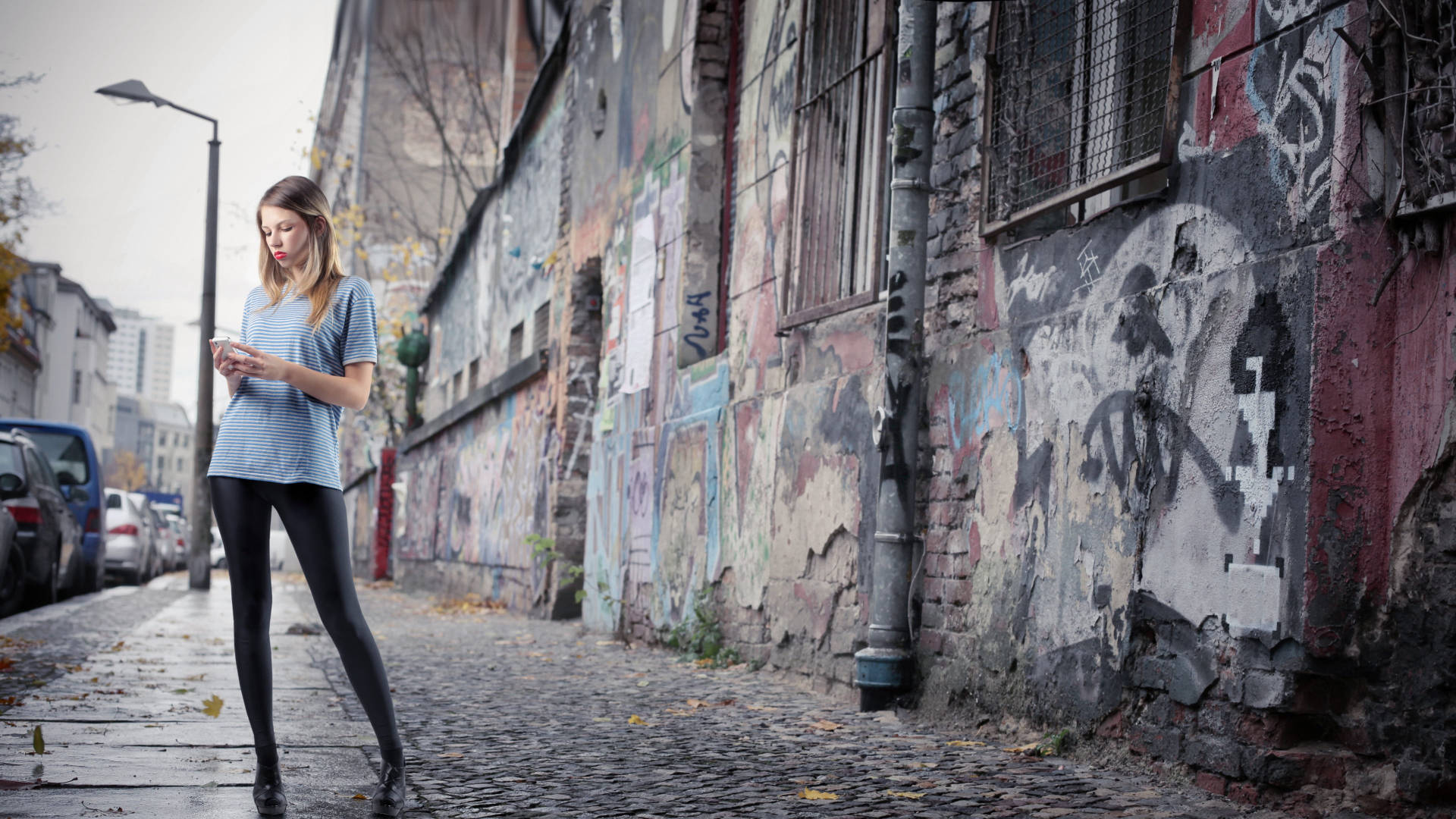 striped shirt, black leggings, graffiti-covered cobblestone alleyway, Full HD Desktop Wallpaper