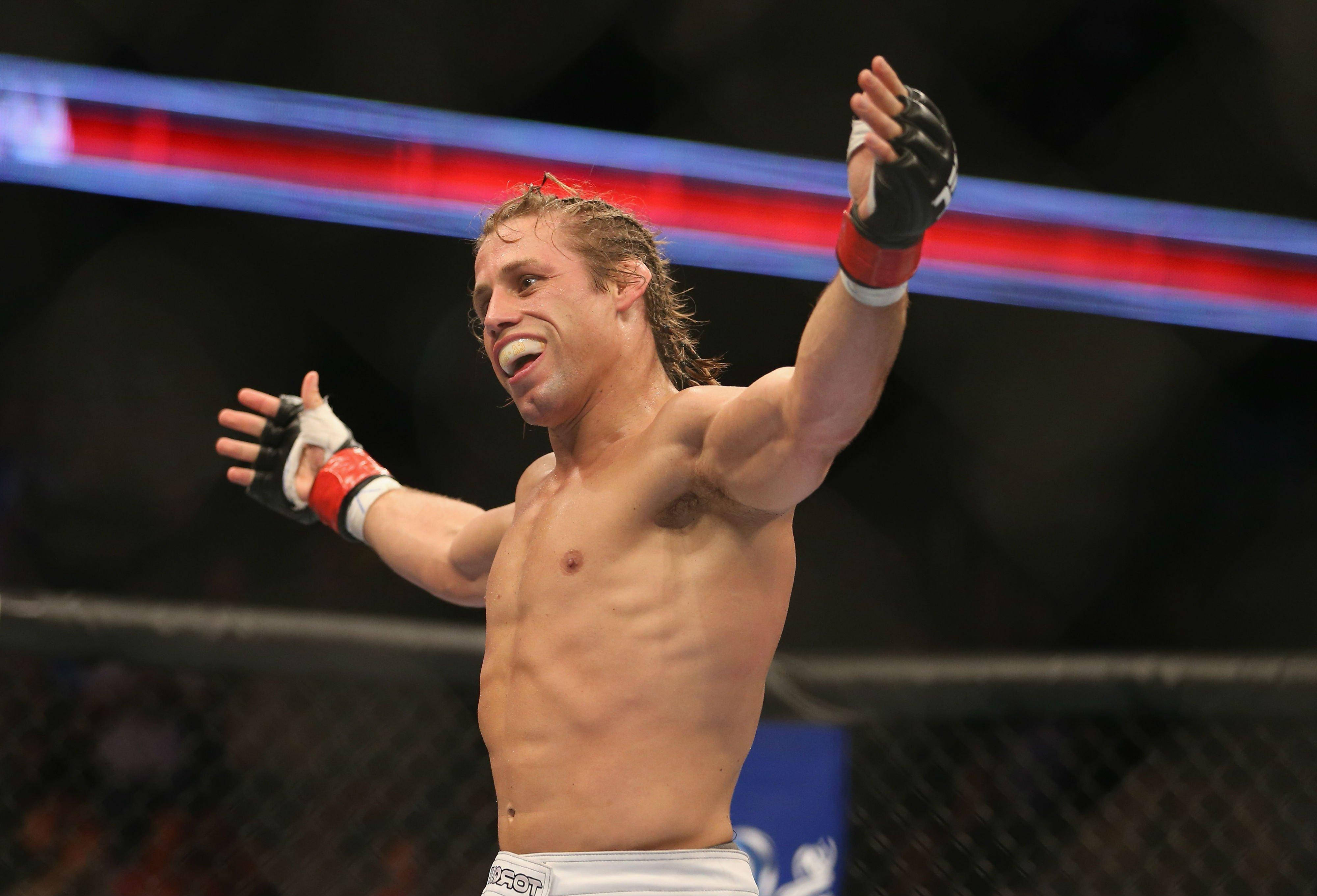Urijah Faber, arms open wide, brightly lit octagon, 4K Desktop Wallpaper