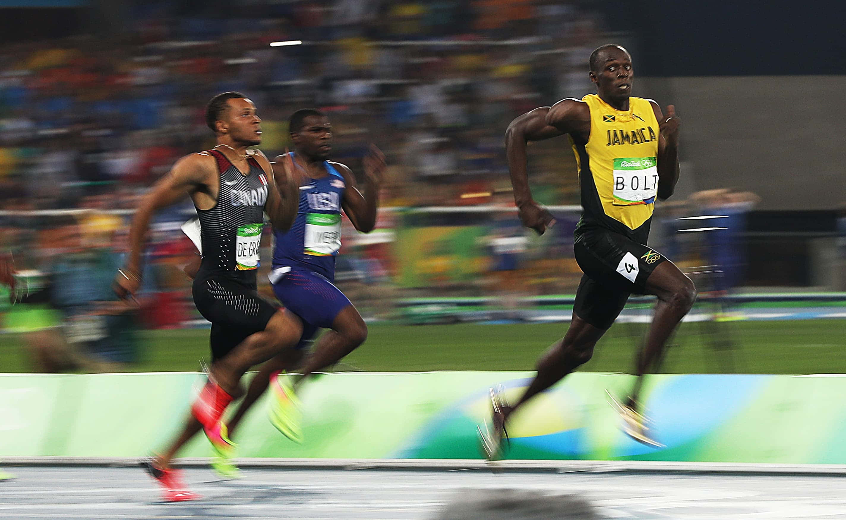 Usain Bolt, yellow Jamaica jersey, stadium lights, 2K Desktop Wallpaper