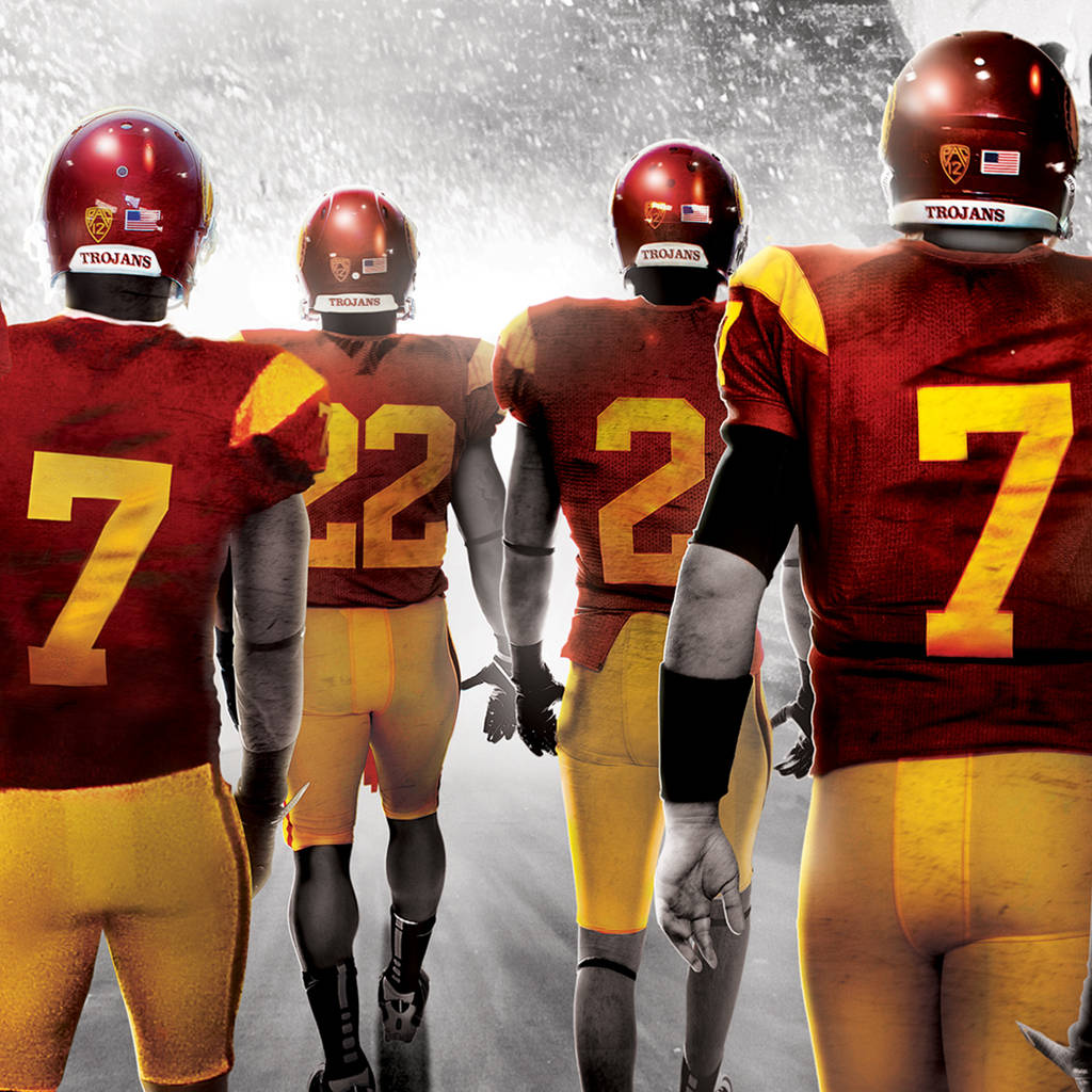 USC Football, red and gold Trojan uniforms, misty field, SD Desktop Wallpaper