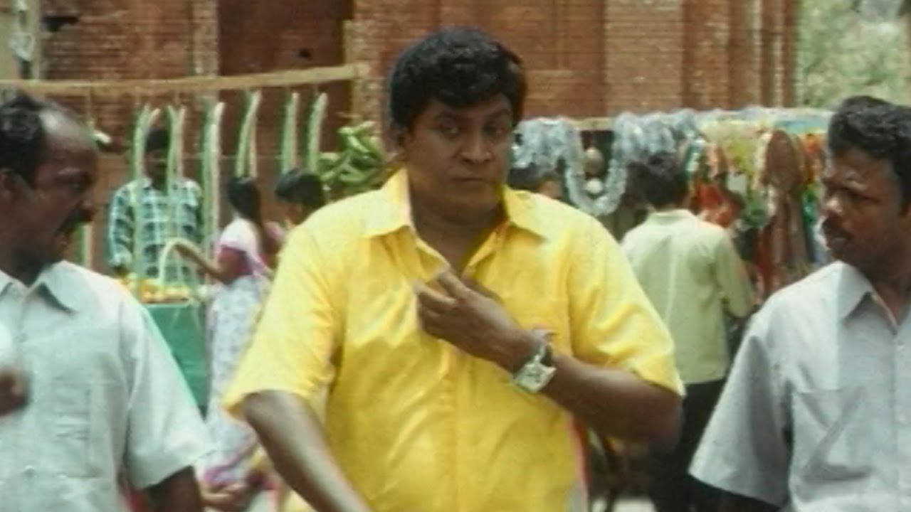 Vadivelu, bright yellow shirt, bustling outdoor market, HD Desktop Wallpaper
