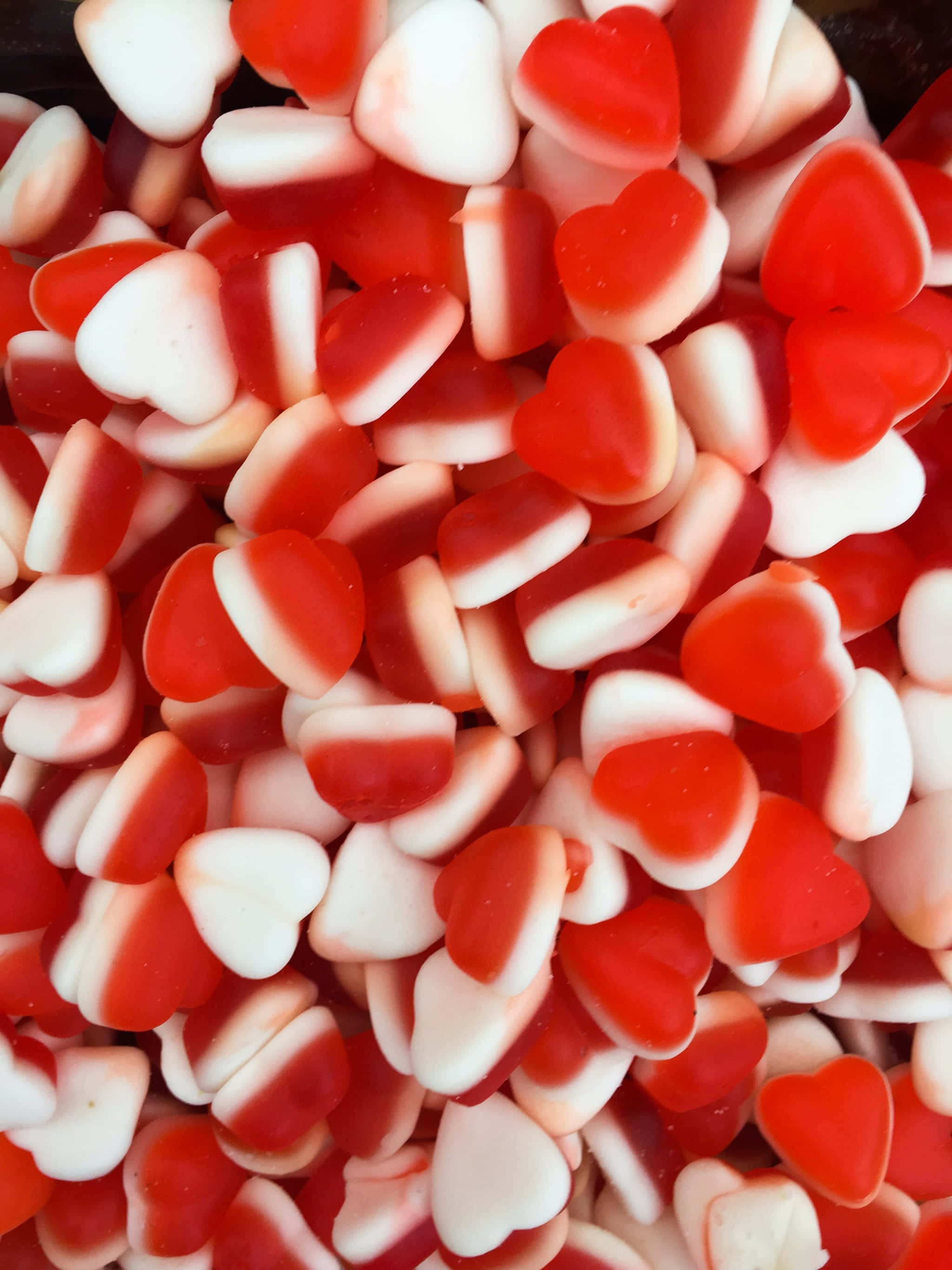 heart-shaped candies, glossy red, white, 2K Phone Wallpaper