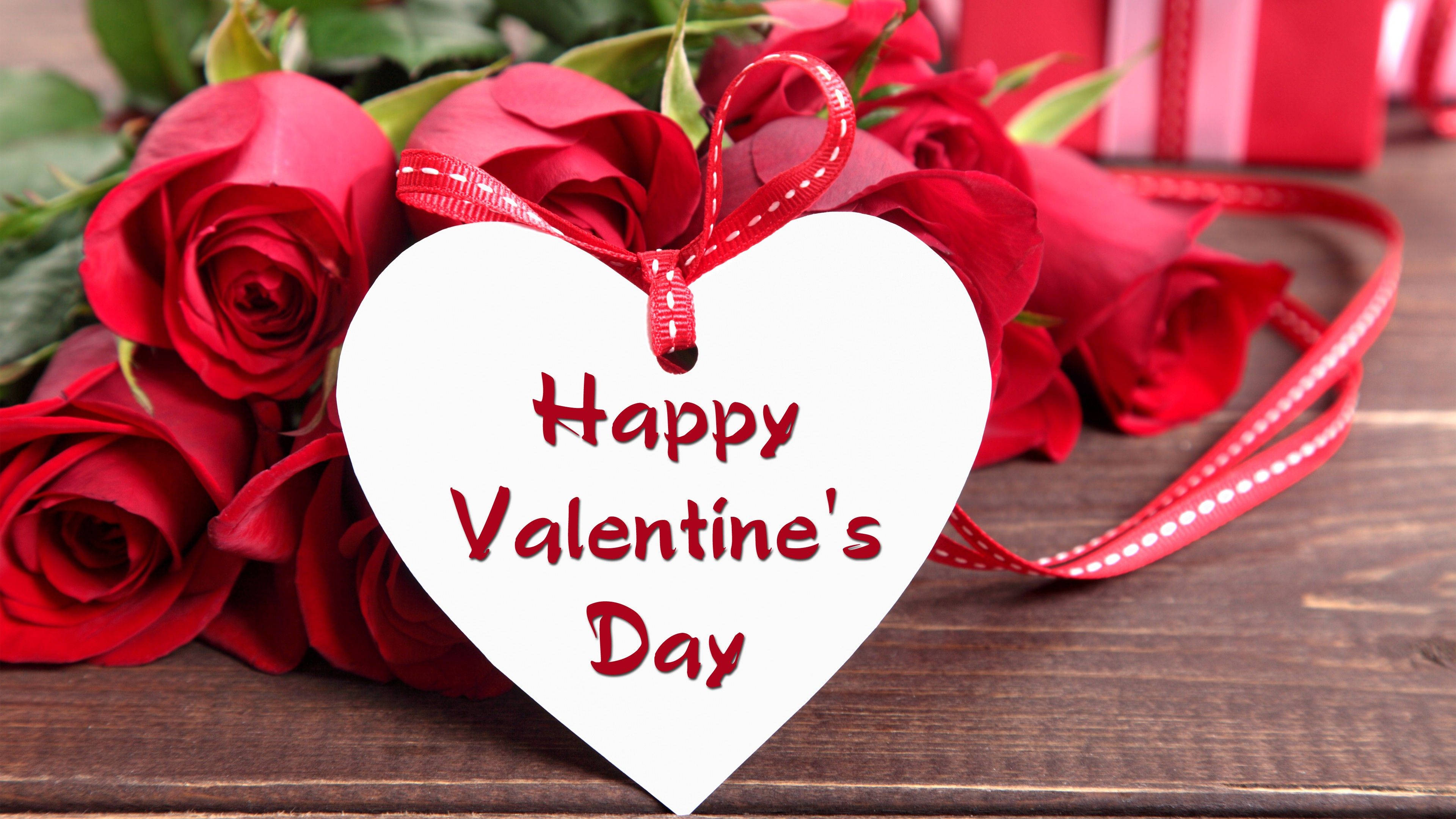 Hearts And Red Roses For Valentines Day, white heart-shaped tag, red cursive text, 4K Desktop Wallpaper