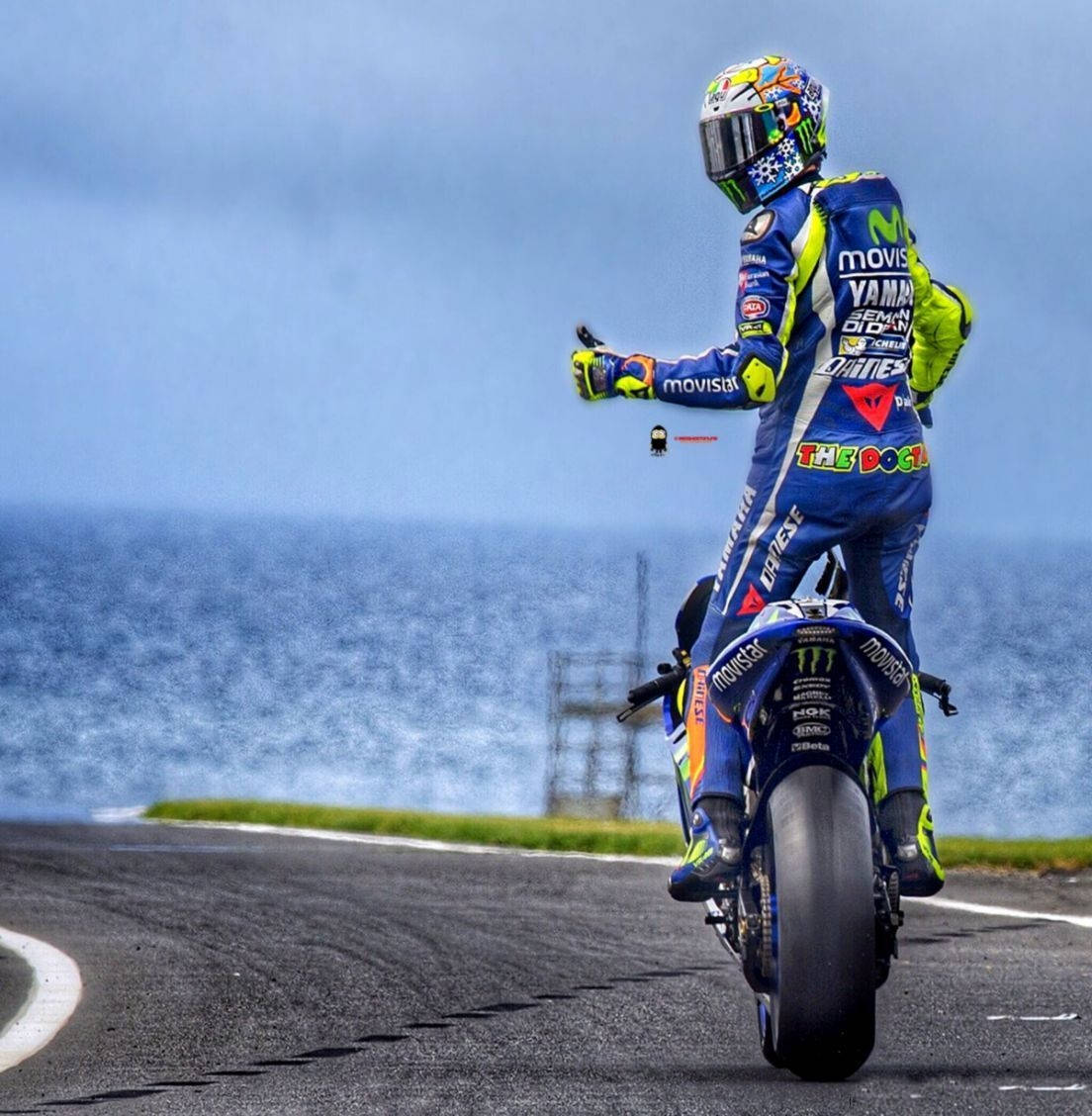 Valentino Rossi, blue and yellow gear, coastal road, SD Phone Wallpaper