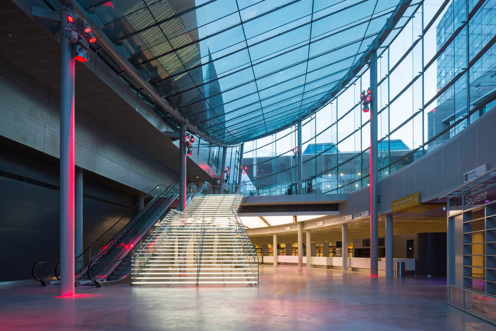Van Gogh Museum, glass-domed atrium, glowing red pillars, HD Desktop Wallpaper