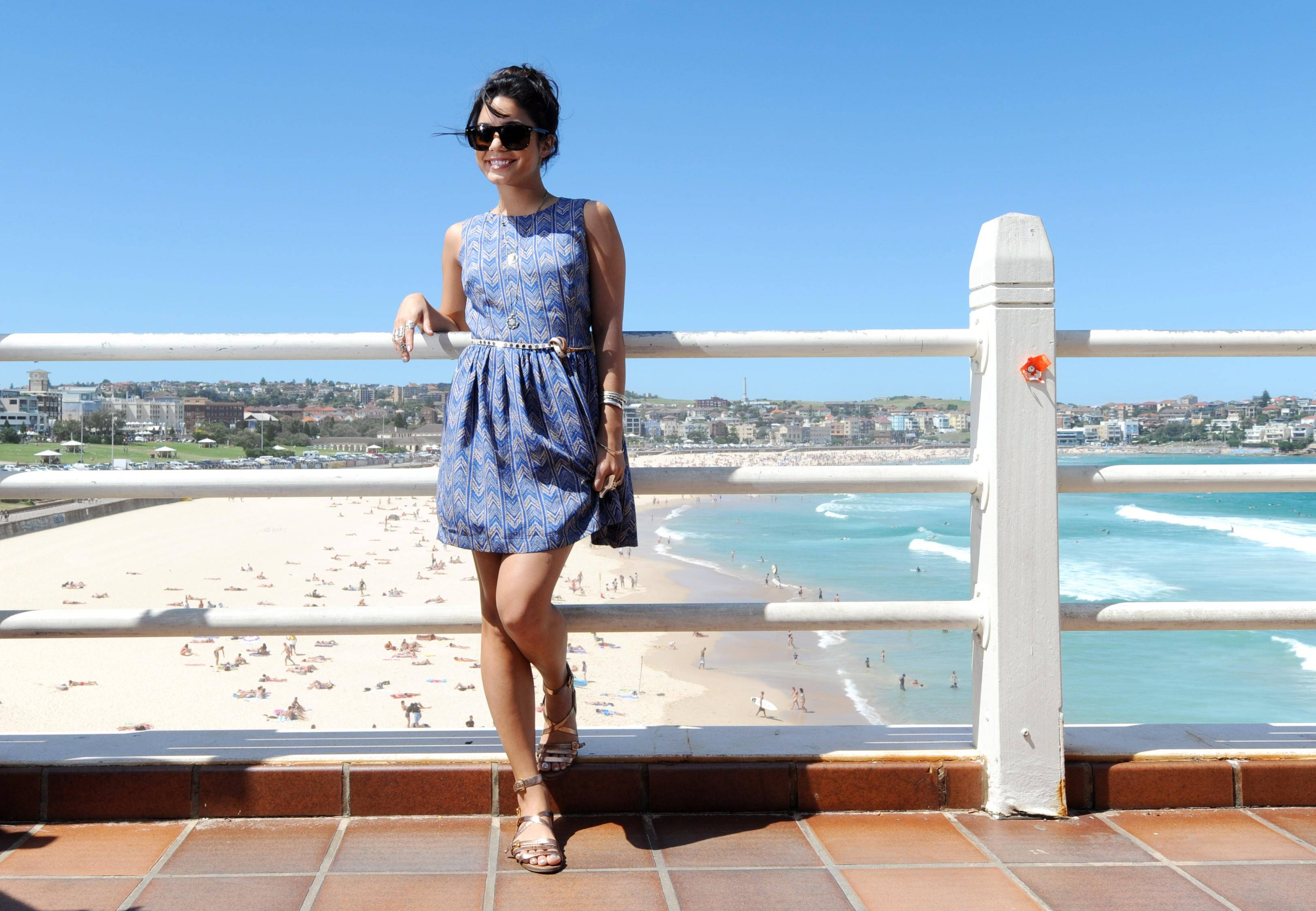 Vanessa Hudgens, blue patterned dress, crowded sunny beach, 2K Desktop Wallpaper
