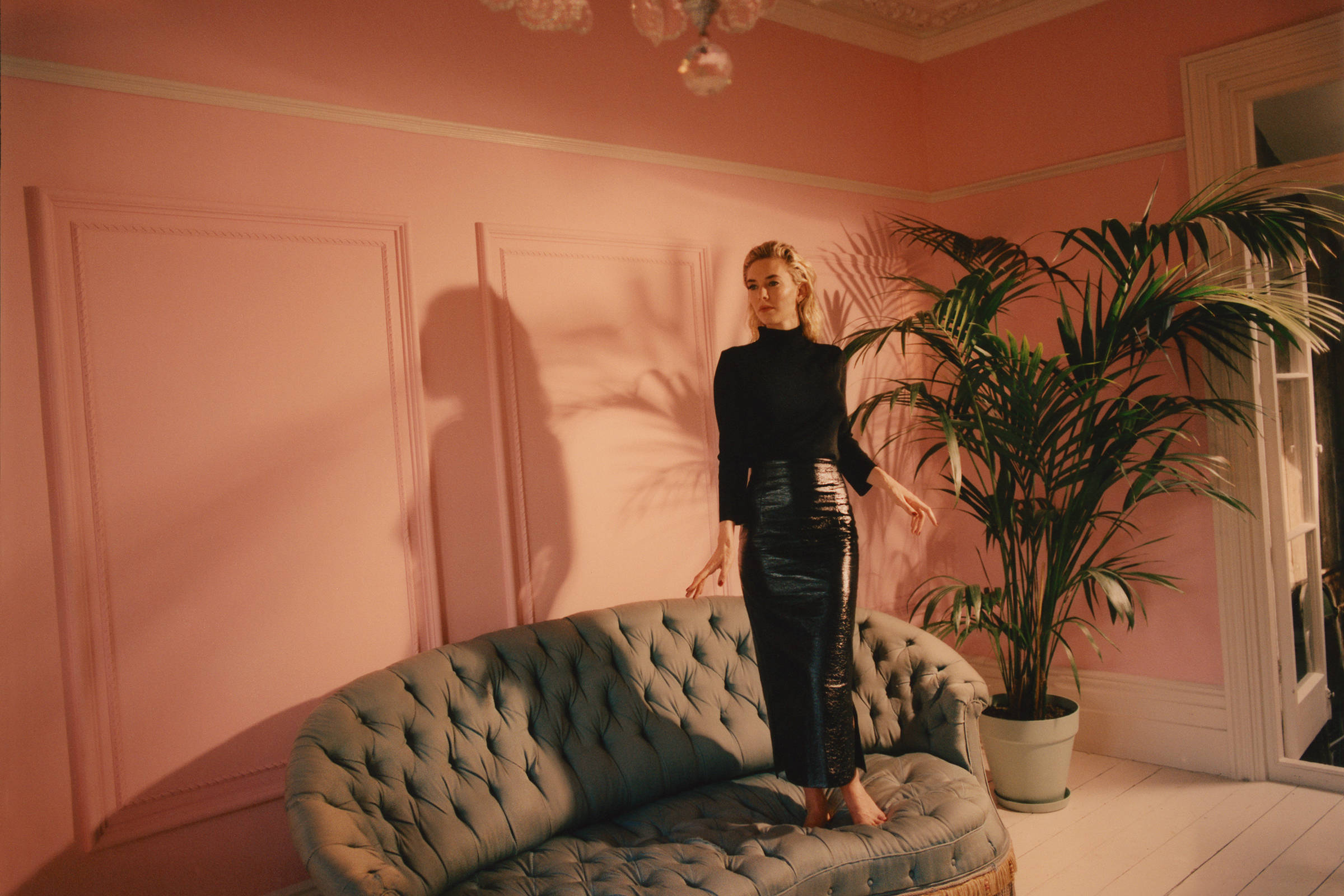 Vanessa Kirby, black leather pants, tufted green sofa, Full HD Desktop Wallpaper