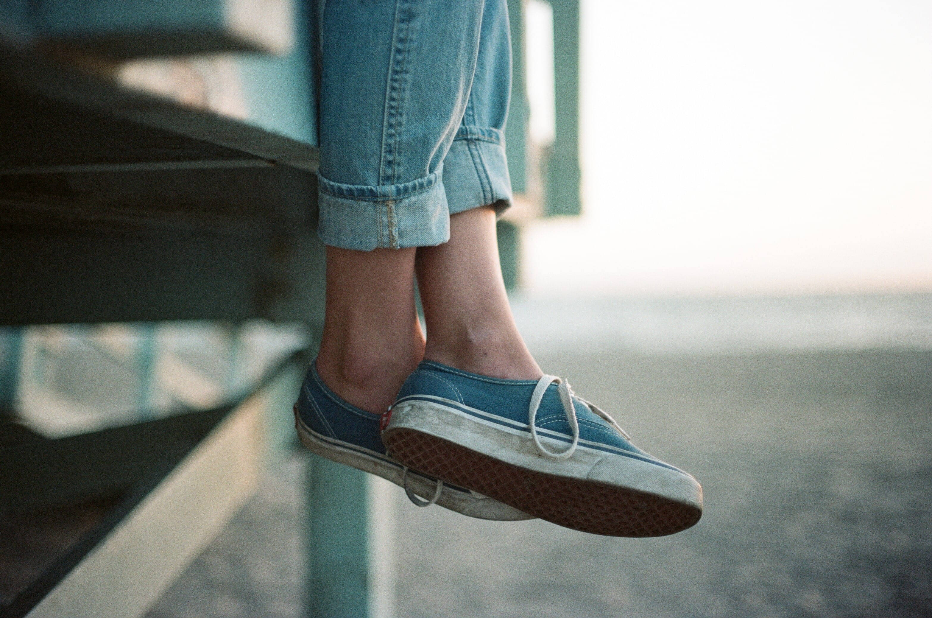 blue Vans, wooden pier railing, calm ocean, 2K Desktop Wallpaper