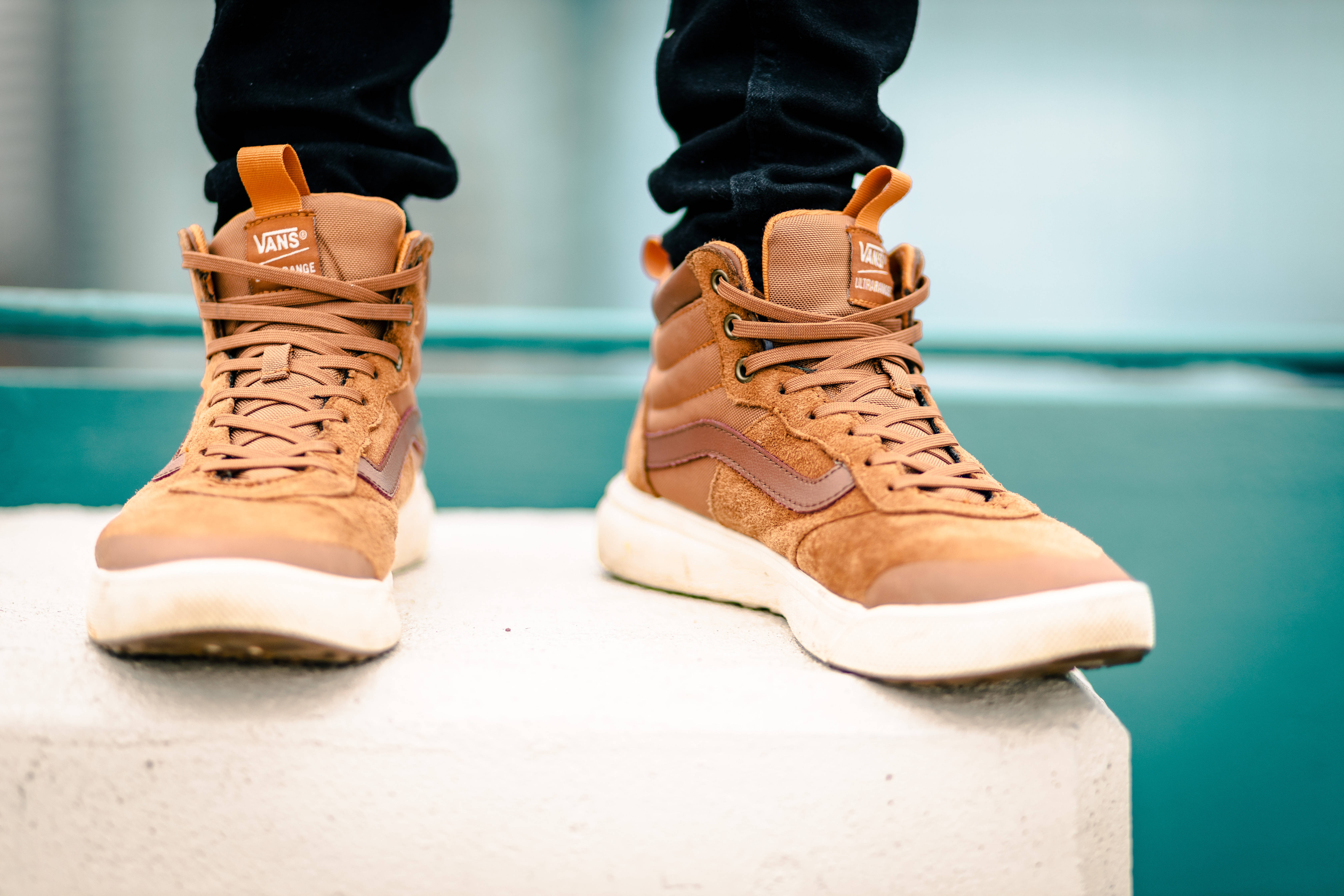 tan suede Vans high-top sneakers, white soles, concrete ledge, 5K Desktop Wallpaper