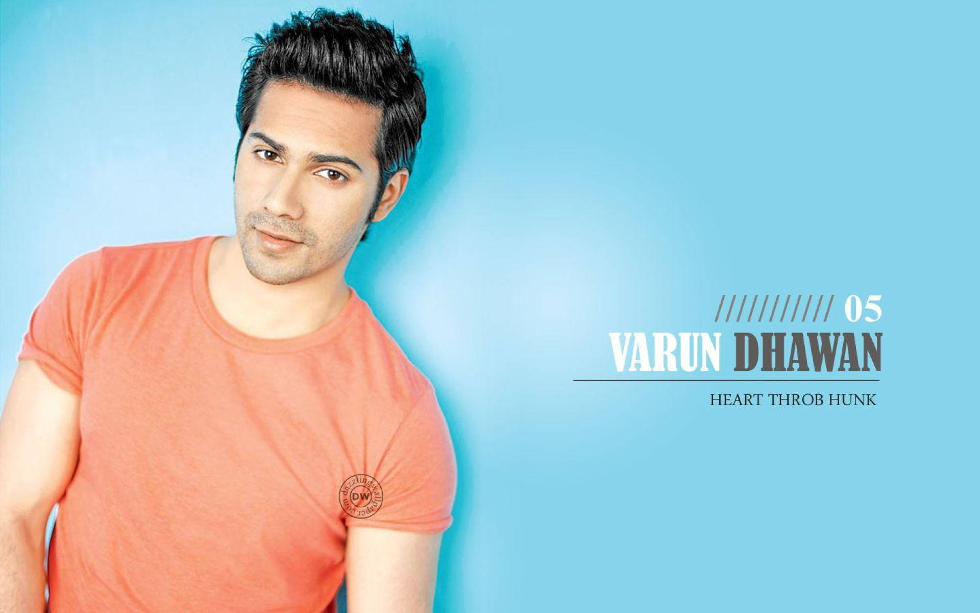 Varun Dhawan, orange t-shirt, solid blue background, Full HD Desktop Wallpaper