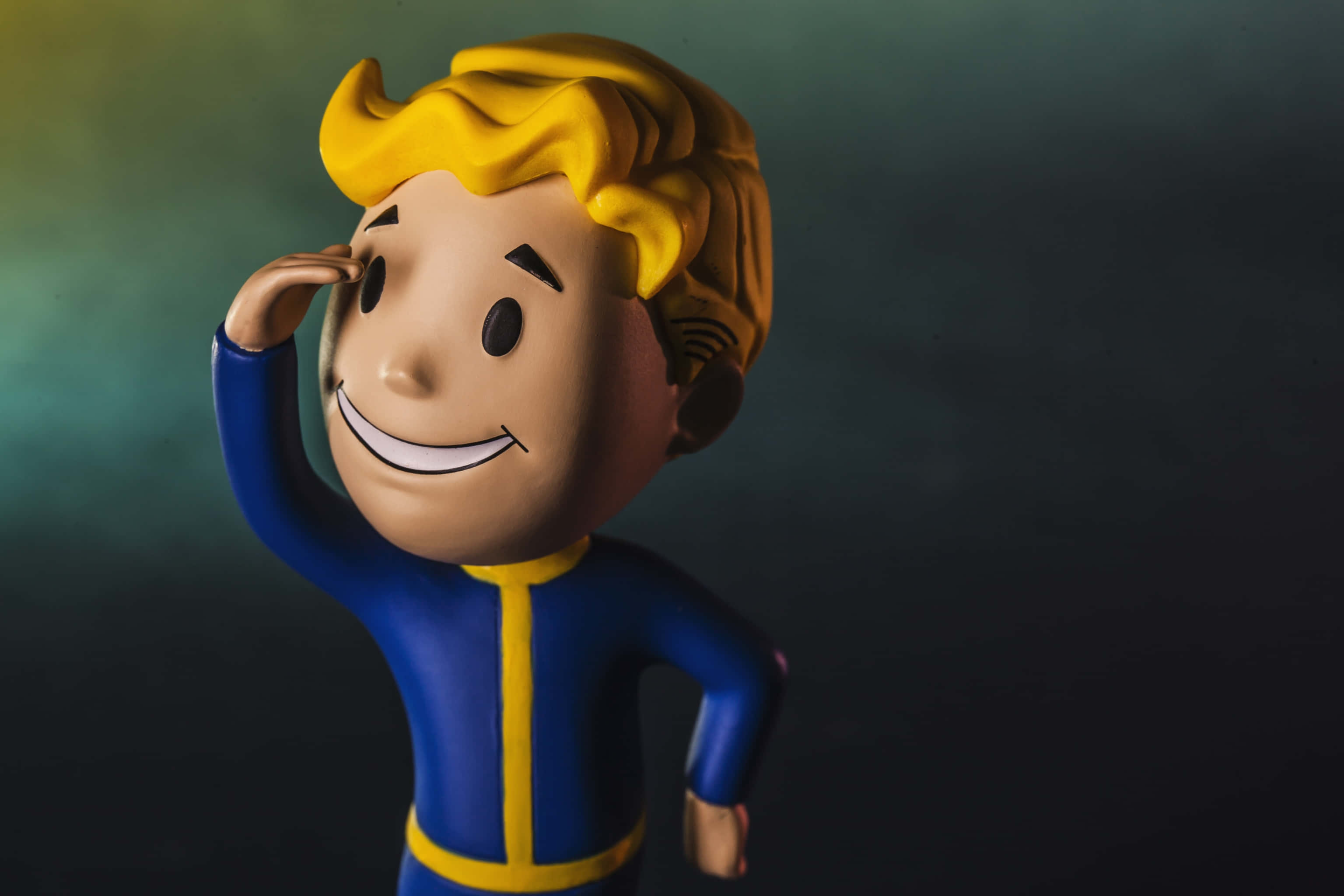 Vault Boy, blue jumpsuit, dark gradient background, 2K Desktop Wallpaper