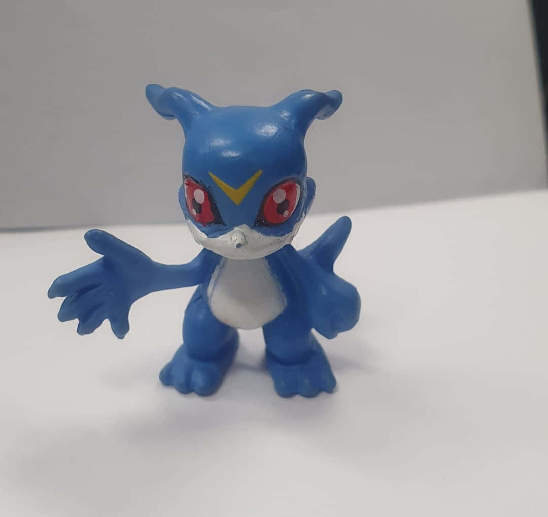Veemon, blue plastic Digimon figurine, red eyes, SD Desktop Wallpaper