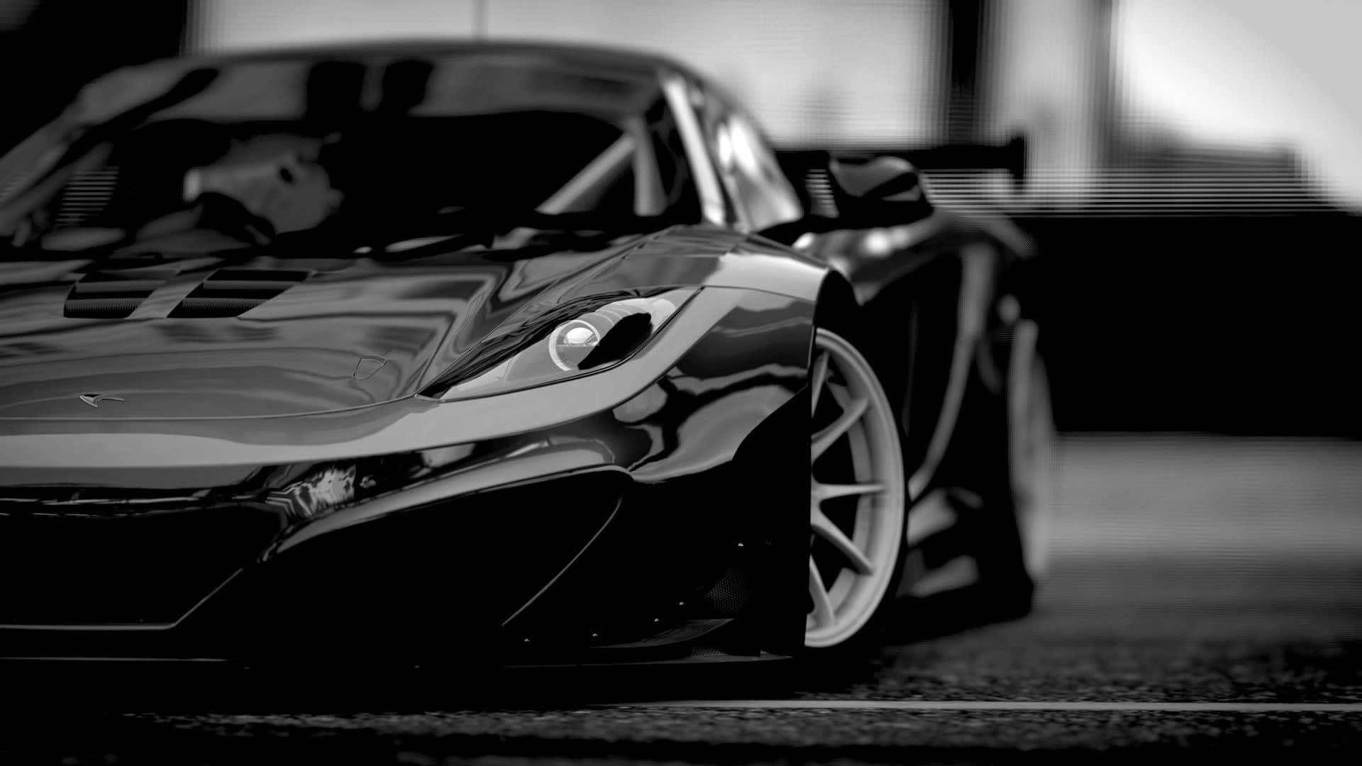 black sports car, sleek, dramatic lighting, Full HD Desktop Wallpaper