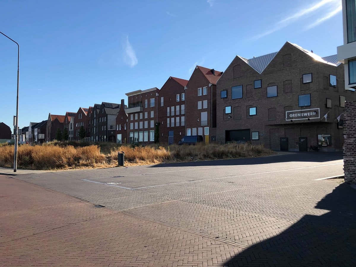 Venlo, modern brick apartment buildings, quiet street, SD Desktop Wallpaper