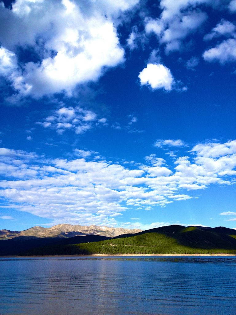 Vertical Landscape, serene lake, vibrant blue sky, SD Phone Wallpaper