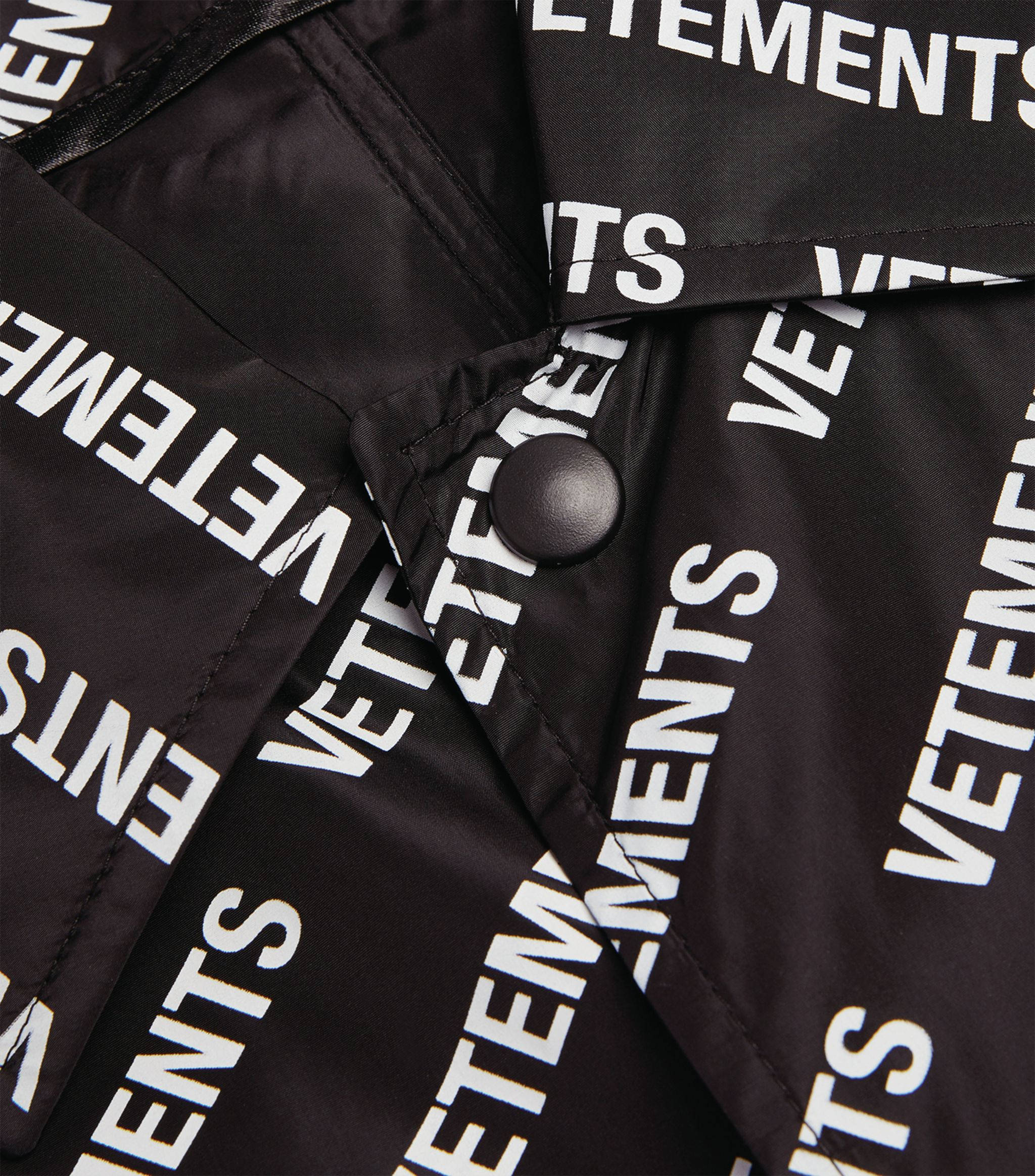 VETEMENTS, black jacket, bold white 'VETEMENTS' text, Full HD Phone Wallpaper